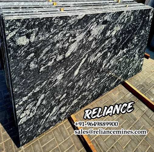 Product Overview: Reliance Titanium Black & Forest Black Granite is a luxurious natural stone celebrated for its striking black background enriched with flowing golden and white veins. Mined from our owned quarry, this granite represents strength, elegance, and timeless beauty — making it a preferred choice for high-end architectural and interior projects across the globe. Each block is a unique creation of nature, offering unmatched character and visual depth. Technical Specifications: Title Reliance Titanium Black & Forest Black Granite Block Stone Type Granite Block Type Gangsaw Block Block Size 300 CM x 180 CM x 180 CM (LXWXH) Color Deep Black with Gold & White Veins Surface Finish Options Wire Saw Cut Density 2960-3000 kg/m3 Compressive Strength 200-250 MPa Water Absorption 0.2%-0.3% Hardness (Mohs) 6 to 7 Porosity Low Origin India Applications Slabs, Countertops, Flooring, Wall Cladding, Interior Key Features: Elegant Aesthetic Appeal: Deep jet-black background enhanced by golden and silver waves — a naturally luxurious look. Superior Strength & Durability: Excellent structural integrity and long-term performance in varied climates. High Polish Retention: Achieves exceptional gloss and mirror-like reflection after finishing. Consistent Texture: Uniform color and grain suitable for large-scale architectural applications. Versatile Application Range: Perfect for multiple interior purposes. Low Maintenance: Resistant to stains, scratches, and moisture, ensuring lasting beauty with minimal upkeep. Export-Grade Blocks: Carefully selected and cut for optimal slab yield and international market standards. Recommended Uses: Kitchen Countertops & Islands Luxury Flooring & Staircases Hotel Lobbies & Reception Areas Wall Cladding & Facades Memorials & Monuments Designer Furniture Tops Why Choose Reliance Titanium Black Granite and Forest Black Granite? Our granite is preferred by export buyers because of: Natural white veins and attractive deep black surface Zero crack, high strength and durability, suitable for projects & reprocessing Consistent Gang Saw block sizes Strict quality checks for each block before shipment Reliable and stable long-term supply Export Capabilities & Payment Terms: We provide smooth, professional export handling with: Payment Options: L/C at sight (Letter of Credit at sight) D/P (Documents Against Payment) T/T advance (if preferred by the buyer) Shipping Documents Provided: Bill of Lading (BL) Commercial Invoice Packing List Certificate of Origin Other documents as per buyer requirements Shipping Price Options: FOB (Indian Port) CNF (any destination port globally) Our logistics team ensures timely loading, documentation, and shipment coordination for a hassle-free experience. About Reliance Mines & Minerals We have a strong presence in the global stone industry, regularly exporting to China, Germany, USA, Oman, and Qatar . Our team is experienced in international trade procedures, ensuring professional communication and smooth cooperation with all partners. We Welcome Your Inquiry If your company is seeking a reliable supplier for premium Titanium black & Forest black granite blocks, we would be pleased to offer quotations, block photos, videos and quarry videos and further details. We look forward to establishing a long-term and successful business relationship with your esteemed company. More About Reliance Titanium Black & Forest Black Granite: Reliance Titanium Black & Forest Black Granite combines natural elegance with engineering excellence. Its bold veins and premium polish bring sophistication to any architectural space, while its robust physical properties ensure durability even in demanding environments. Each block is meticulously extracted and inspected to meet international export quality benchmarks. Reliance Mines & Minerals specializes in the sales and global export of premium granite blocks and slabs. With years of experience in the stone industry, we have established a strong presence in international markets. We are committed to delivering top-quality granite with timely and reliable shipments to major ports worldwide. Our dedicated sales and logistics team is highly skilled in managing export documentation, container loading, and shipping procedures, ensuring a smooth and hassle-free experience for our clients. At the heart of our business is a focus on excellence, professionalism, and customer satisfaction, making us a trusted partner for granite buyers around the globe. 印度 花岗岩 块料 泰坦黑 花岗岩 印度 森林黑 花岗岩 印度 印度 花岗岩 块料, 印度 出口 花岗岩 块, 印度花岗岩原石 中国进口 India granite block Titanium Black granite India Forest Black granite India Granite Blocks Titanium Black Granite Reliance Titanium Black Granite Titanium Black Granite Slabs Polished Titanium Black Granite Bookmatch Titanium Black Granite Titanium Black Granite Exporters India Titanium Black Granite Suppliers Titanium Black Granite Manufacturers Exotic Black Granite with White Veins Deep Black Granite Slabs Mirror Polished Granite Luxury Granite for Interior Walls Natural Stone for Modern Architecture High Gloss Granite Panels Bookmatched Granite Wall Design Black Granite for Hotel Lobby & Flooring Designer Granite Slabs for Projects Indian Granite Exporters Premium Granite from India Granite Slabs for Export Worldwide Granite Supplier Natural Stone Exporter from India Wholesale Granite Supplier Black Granite for Construction & Interiors Architectural Granite Stone Supplier Custom Cut Granite Slabs Export Granite for Wall Cladding Granite for Flooring Granite for Kitchen Countertops Granite for Hotel & Commercial Projects Interior Stone Cladding Luxury Stone for Architects & Designers Black Forest Granite supplier Black Forest Granite manufacturer Black Forest Granite exporter Black Forest Granite quarry Black Forest Granite wholesaler Black Forest Granite seller Buy Black Forest Granite blocks Buy Black Forest Granite slabs Black Forest Granite for flooring Black Forest Granite for countertops Black Forest Granite for wall cladding Black Forest Granite price per sqm Black Forest Granite bulk supplier Black Forest Granite block exporter Black Forest Granite slab manufacturer Black Forest Granite quarry owner Black Forest Granite wholesale price Black Forest Granite large quantity supplier Black Forest Granite custom sizes Black Forest Granite supplier India Black Forest Granite manufacturer India Black Forest Granite exporter India Black Forest Granite quarry India Black Forest Granite supplier [Your City/State] Black Forest Granite international exporter Premium Black Forest Granite supplier Natural Black Forest Granite stone High quality Black Forest Granite slabs Black Forest Granite direct from quarry Black Forest Granite blocks for export Black Forest Granite polished slabs Black granite stone supplier Natural granite stone exporter Indian black granite manufacturer Granite blocks and slabs exporter Dimension stone granite supplier Nebula Wave Granite Stone Manufacturer Export Quality Blocks Supplier Quarry Reliance Mines India Titanium Black Granite Stone Manufacturer Export Quality Blocks Supplier Quarry Reliance Mines India Cosmic Black Granite Stone Manufacturer Export Quality Blocks Supplier Quarry Reliance Mines India Marquina Black Granite Stone Manufacturer Export Quality Blocks Supplier Quarry Reliance Mines India Black Forest Granite Stone Manufacturer Export Quality Blocks Supplier Quarry Reliance Mines India #TitaniumBlackGranite #RelianceGranite #IndianGranite #GraniteExporter #LuxuryGranite #GraniteSupplier #BlackGranite #NaturalStoneIndia #GraniteSlabs #GraniteBookmatch #InteriorDesignStone #ArchitecturalStone #PremiumGranite #GraniteExport #GraniteDesigns #reliancemines #granite #marble #stone #quarry #forestblackgranite