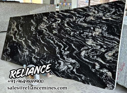 Product Overview: Reliance Titanium Black & Forest Black Granite is a luxurious natural stone celebrated for its striking black background enriched with flowing golden and white veins. Mined from our owned quarry, this granite represents strength, elegance, and timeless beauty — making it a preferred choice for high-end architectural and interior projects across the globe. Each block is a unique creation of nature, offering unmatched character and visual depth. Technical Specifications: Title Reliance Titanium Black & Forest Black Granite Block Stone Type Granite Block Type Gangsaw Block Block Size 300 CM x 180 CM x 180 CM (LXWXH) Color Deep Black with Gold & White Veins Surface Finish Options Wire Saw Cut Density 2960-3000 kg/m3 Compressive Strength 200-250 MPa Water Absorption 0.2%-0.3% Hardness (Mohs) 6 to 7 Porosity Low Origin India Applications Slabs, Countertops, Flooring, Wall Cladding, Interior Key Features: Elegant Aesthetic Appeal: Deep jet-black background enhanced by golden and silver waves — a naturally luxurious look. Superior Strength & Durability: Excellent structural integrity and long-term performance in varied climates. High Polish Retention: Achieves exceptional gloss and mirror-like reflection after finishing. Consistent Texture: Uniform color and grain suitable for large-scale architectural applications. Versatile Application Range: Perfect for multiple interior purposes. Low Maintenance: Resistant to stains, scratches, and moisture, ensuring lasting beauty with minimal upkeep. Export-Grade Blocks: Carefully selected and cut for optimal slab yield and international market standards. Recommended Uses: Kitchen Countertops & Islands Luxury Flooring & Staircases Hotel Lobbies & Reception Areas Wall Cladding & Facades Memorials & Monuments Designer Furniture Tops Why Choose Reliance Titanium Black Granite and Forest Black Granite? Our granite is preferred by export buyers because of: Natural white veins and attractive deep black surface Zero crack, high strength and durability, suitable for projects & reprocessing Consistent Gang Saw block sizes Strict quality checks for each block before shipment Reliable and stable long-term supply Export Capabilities & Payment Terms: We provide smooth, professional export handling with: Payment Options: L/C at sight (Letter of Credit at sight) D/P (Documents Against Payment) T/T advance (if preferred by the buyer) Shipping Documents Provided: Bill of Lading (BL) Commercial Invoice Packing List Certificate of Origin Other documents as per buyer requirements Shipping Price Options: FOB (Indian Port) CNF (any destination port globally) Our logistics team ensures timely loading, documentation, and shipment coordination for a hassle-free experience. About Reliance Mines & Minerals We have a strong presence in the global stone industry, regularly exporting to China, Germany, USA, Oman, and Qatar . Our team is experienced in international trade procedures, ensuring professional communication and smooth cooperation with all partners. We Welcome Your Inquiry If your company is seeking a reliable supplier for premium Titanium black & Forest black granite blocks, we would be pleased to offer quotations, block photos, videos and quarry videos and further details. We look forward to establishing a long-term and successful business relationship with your esteemed company. More About Reliance Titanium Black & Forest Black Granite: Reliance Titanium Black & Forest Black Granite combines natural elegance with engineering excellence. Its bold veins and premium polish bring sophistication to any architectural space, while its robust physical properties ensure durability even in demanding environments. Each block is meticulously extracted and inspected to meet international export quality benchmarks. Reliance Mines & Minerals specializes in the sales and global export of premium granite blocks and slabs. With years of experience in the stone industry, we have established a strong presence in international markets. We are committed to delivering top-quality granite with timely and reliable shipments to major ports worldwide. Our dedicated sales and logistics team is highly skilled in managing export documentation, container loading, and shipping procedures, ensuring a smooth and hassle-free experience for our clients. At the heart of our business is a focus on excellence, professionalism, and customer satisfaction, making us a trusted partner for granite buyers around the globe. 印度 花岗岩 块料 泰坦黑 花岗岩 印度 森林黑 花岗岩 印度 印度 花岗岩 块料, 印度 出口 花岗岩 块, 印度花岗岩原石 中国进口 India granite block Titanium Black granite India Forest Black granite India Granite Blocks Titanium Black Granite Reliance Titanium Black Granite Titanium Black Granite Slabs Polished Titanium Black Granite Bookmatch Titanium Black Granite Titanium Black Granite Exporters India Titanium Black Granite Suppliers Titanium Black Granite Manufacturers Exotic Black Granite with White Veins Deep Black Granite Slabs Mirror Polished Granite Luxury Granite for Interior Walls Natural Stone for Modern Architecture High Gloss Granite Panels Bookmatched Granite Wall Design Black Granite for Hotel Lobby & Flooring Designer Granite Slabs for Projects Indian Granite Exporters Premium Granite from India Granite Slabs for Export Worldwide Granite Supplier Natural Stone Exporter from India Wholesale Granite Supplier Black Granite for Construction & Interiors Architectural Granite Stone Supplier Custom Cut Granite Slabs Export Granite for Wall Cladding Granite for Flooring Granite for Kitchen Countertops Granite for Hotel & Commercial Projects Interior Stone Cladding Luxury Stone for Architects & Designers Black Forest Granite supplier Black Forest Granite manufacturer Black Forest Granite exporter Black Forest Granite quarry Black Forest Granite wholesaler Black Forest Granite seller Buy Black Forest Granite blocks Buy Black Forest Granite slabs Black Forest Granite for flooring Black Forest Granite for countertops Black Forest Granite for wall cladding Black Forest Granite price per sqm Black Forest Granite bulk supplier Black Forest Granite block exporter Black Forest Granite slab manufacturer Black Forest Granite quarry owner Black Forest Granite wholesale price Black Forest Granite large quantity supplier Black Forest Granite custom sizes Black Forest Granite supplier India Black Forest Granite manufacturer India Black Forest Granite exporter India Black Forest Granite quarry India Black Forest Granite supplier [Your City/State] Black Forest Granite international exporter Premium Black Forest Granite supplier Natural Black Forest Granite stone High quality Black Forest Granite slabs Black Forest Granite direct from quarry Black Forest Granite blocks for export Black Forest Granite polished slabs Black granite stone supplier Natural granite stone exporter Indian black granite manufacturer Granite blocks and slabs exporter Dimension stone granite supplier Nebula Wave Granite Stone Manufacturer Export Quality Blocks Supplier Quarry Reliance Mines India Titanium Black Granite Stone Manufacturer Export Quality Blocks Supplier Quarry Reliance Mines India Cosmic Black Granite Stone Manufacturer Export Quality Blocks Supplier Quarry Reliance Mines India Marquina Black Granite Stone Manufacturer Export Quality Blocks Supplier Quarry Reliance Mines India Black Forest Granite Stone Manufacturer Export Quality Blocks Supplier Quarry Reliance Mines India #TitaniumBlackGranite #RelianceGranite #IndianGranite #GraniteExporter #LuxuryGranite #GraniteSupplier #BlackGranite #NaturalStoneIndia #GraniteSlabs #GraniteBookmatch #InteriorDesignStone #ArchitecturalStone #PremiumGranite #GraniteExport #GraniteDesigns #reliancemines #granite #marble #stone #quarry #forestblackgranite