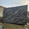 Product Overview: Reliance Titanium Black & Forest Black Granite is a luxurious natural stone celebrated for its striking black background enriched with flowing golden and white veins. Mined from our owned quarry, this granite represents strength, elegance, and timeless beauty — making it a preferred choice for high-end architectural and interior projects across the globe. Each block is a unique creation of nature, offering unmatched character and visual depth. Technical Specifications: Title Reliance Titanium Black & Forest Black Granite Block Stone Type Granite Block Type Gangsaw Block Block Size 300 CM x 180 CM x 180 CM (LXWXH) Color Deep Black with Gold & White Veins Surface Finish Options Wire Saw Cut Density 2960-3000 kg/m3 Compressive Strength 200-250 MPa Water Absorption 0.2%-0.3% Hardness (Mohs) 6 to 7 Porosity Low Origin India Applications Slabs, Countertops, Flooring, Wall Cladding, Interior Key Features: Elegant Aesthetic Appeal: Deep jet-black background enhanced by golden and silver waves — a naturally luxurious look. Superior Strength & Durability: Excellent structural integrity and long-term performance in varied climates. High Polish Retention: Achieves exceptional gloss and mirror-like reflection after finishing. Consistent Texture: Uniform color and grain suitable for large-scale architectural applications. Versatile Application Range: Perfect for multiple interior purposes. Low Maintenance: Resistant to stains, scratches, and moisture, ensuring lasting beauty with minimal upkeep. Export-Grade Blocks: Carefully selected and cut for optimal slab yield and international market standards. Recommended Uses: Kitchen Countertops & Islands Luxury Flooring & Staircases Hotel Lobbies & Reception Areas Wall Cladding & Facades Memorials & Monuments Designer Furniture Tops Why Choose Reliance Titanium Black Granite and Forest Black Granite? Our granite is preferred by export buyers because of: Natural white veins and attractive deep black surface Zero crack, high strength and durability, suitable for projects & reprocessing Consistent Gang Saw block sizes Strict quality checks for each block before shipment Reliable and stable long-term supply Export Capabilities & Payment Terms: We provide smooth, professional export handling with: Payment Options: L/C at sight (Letter of Credit at sight) D/P (Documents Against Payment) T/T advance (if preferred by the buyer) Shipping Documents Provided: Bill of Lading (BL) Commercial Invoice Packing List Certificate of Origin Other documents as per buyer requirements Shipping Price Options: FOB (Indian Port) CNF (any destination port globally) Our logistics team ensures timely loading, documentation, and shipment coordination for a hassle-free experience. About Reliance Mines & Minerals We have a strong presence in the global stone industry, regularly exporting to China, Germany, USA, Oman, and Qatar . Our team is experienced in international trade procedures, ensuring professional communication and smooth cooperation with all partners. We Welcome Your Inquiry If your company is seeking a reliable supplier for premium Titanium black & Forest black granite blocks, we would be pleased to offer quotations, block photos, videos and quarry videos and further details. We look forward to establishing a long-term and successful business relationship with your esteemed company. More About Reliance Titanium Black & Forest Black Granite: Reliance Titanium Black & Forest Black Granite combines natural elegance with engineering excellence. Its bold veins and premium polish bring sophistication to any architectural space, while its robust physical properties ensure durability even in demanding environments. Each block is meticulously extracted and inspected to meet international export quality benchmarks. Reliance Mines & Minerals specializes in the sales and global export of premium granite blocks and slabs. With years of experience in the stone industry, we have established a strong presence in international markets. We are committed to delivering top-quality granite with timely and reliable shipments to major ports worldwide. Our dedicated sales and logistics team is highly skilled in managing export documentation, container loading, and shipping procedures, ensuring a smooth and hassle-free experience for our clients. At the heart of our business is a focus on excellence, professionalism, and customer satisfaction, making us a trusted partner for granite buyers around the globe. 印度 花岗岩 块料 泰坦黑 花岗岩 印度 森林黑 花岗岩 印度 印度 花岗岩 块料, 印度 出口 花岗岩 块, 印度花岗岩原石 中国进口 India granite block Titanium Black granite India Forest Black granite India Granite Blocks Titanium Black Granite Reliance Titanium Black Granite Titanium Black Granite Slabs Polished Titanium Black Granite Bookmatch Titanium Black Granite Titanium Black Granite Exporters India Titanium Black Granite Suppliers Titanium Black Granite Manufacturers Exotic Black Granite with White Veins Deep Black Granite Slabs Mirror Polished Granite Luxury Granite for Interior Walls Natural Stone for Modern Architecture High Gloss Granite Panels Bookmatched Granite Wall Design Black Granite for Hotel Lobby & Flooring Designer Granite Slabs for Projects Indian Granite Exporters Premium Granite from India Granite Slabs for Export Worldwide Granite Supplier Natural Stone Exporter from India Wholesale Granite Supplier Black Granite for Construction & Interiors Architectural Granite Stone Supplier Custom Cut Granite Slabs Export Granite for Wall Cladding Granite for Flooring Granite for Kitchen Countertops Granite for Hotel & Commercial Projects Interior Stone Cladding Luxury Stone for Architects & Designers Black Forest Granite supplier Black Forest Granite manufacturer Black Forest Granite exporter Black Forest Granite quarry Black Forest Granite wholesaler Black Forest Granite seller Buy Black Forest Granite blocks Buy Black Forest Granite slabs Black Forest Granite for flooring Black Forest Granite for countertops Black Forest Granite for wall cladding Black Forest Granite price per sqm Black Forest Granite bulk supplier Black Forest Granite block exporter Black Forest Granite slab manufacturer Black Forest Granite quarry owner Black Forest Granite wholesale price Black Forest Granite large quantity supplier Black Forest Granite custom sizes Black Forest Granite supplier India Black Forest Granite manufacturer India Black Forest Granite exporter India Black Forest Granite quarry India Black Forest Granite supplier [Your City/State] Black Forest Granite international exporter Premium Black Forest Granite supplier Natural Black Forest Granite stone High quality Black Forest Granite slabs Black Forest Granite direct from quarry Black Forest Granite blocks for export Black Forest Granite polished slabs Black granite stone supplier Natural granite stone exporter Indian black granite manufacturer Granite blocks and slabs exporter Dimension stone granite supplier Nebula Wave Granite Stone Manufacturer Export Quality Blocks Supplier Quarry Reliance Mines India Titanium Black Granite Stone Manufacturer Export Quality Blocks Supplier Quarry Reliance Mines India Cosmic Black Granite Stone Manufacturer Export Quality Blocks Supplier Quarry Reliance Mines India Marquina Black Granite Stone Manufacturer Export Quality Blocks Supplier Quarry Reliance Mines India Black Forest Granite Stone Manufacturer Export Quality Blocks Supplier Quarry Reliance Mines India #TitaniumBlackGranite #RelianceGranite #IndianGranite #GraniteExporter #LuxuryGranite #GraniteSupplier #BlackGranite #NaturalStoneIndia #GraniteSlabs #GraniteBookmatch #InteriorDesignStone #ArchitecturalStone #PremiumGranite #GraniteExport #GraniteDesigns #reliancemines #granite #marble #stone #quarry #forestblackgranite