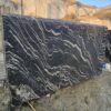 Product Overview: Reliance Titanium Black & Forest Black Granite is a luxurious natural stone celebrated for its striking black background enriched with flowing golden and white veins. Mined from our owned quarry, this granite represents strength, elegance, and timeless beauty — making it a preferred choice for high-end architectural and interior projects across the globe. Each block is a unique creation of nature, offering unmatched character and visual depth. Technical Specifications: Title Reliance Titanium Black & Forest Black Granite Block Stone Type Granite Block Type Gangsaw Block Block Size 300 CM x 180 CM x 180 CM (LXWXH) Color Deep Black with Gold & White Veins Surface Finish Options Wire Saw Cut Density 2960-3000 kg/m3 Compressive Strength 200-250 MPa Water Absorption 0.2%-0.3% Hardness (Mohs) 6 to 7 Porosity Low Origin India Applications Slabs, Countertops, Flooring, Wall Cladding, Interior Key Features: Elegant Aesthetic Appeal: Deep jet-black background enhanced by golden and silver waves — a naturally luxurious look. Superior Strength & Durability: Excellent structural integrity and long-term performance in varied climates. High Polish Retention: Achieves exceptional gloss and mirror-like reflection after finishing. Consistent Texture: Uniform color and grain suitable for large-scale architectural applications. Versatile Application Range: Perfect for multiple interior purposes. Low Maintenance: Resistant to stains, scratches, and moisture, ensuring lasting beauty with minimal upkeep. Export-Grade Blocks: Carefully selected and cut for optimal slab yield and international market standards. Recommended Uses: Kitchen Countertops & Islands Luxury Flooring & Staircases Hotel Lobbies & Reception Areas Wall Cladding & Facades Memorials & Monuments Designer Furniture Tops Why Choose Reliance Titanium Black Granite and Forest Black Granite? Our granite is preferred by export buyers because of: Natural white veins and attractive deep black surface Zero crack, high strength and durability, suitable for projects & reprocessing Consistent Gang Saw block sizes Strict quality checks for each block before shipment Reliable and stable long-term supply Export Capabilities & Payment Terms: We provide smooth, professional export handling with: Payment Options: L/C at sight (Letter of Credit at sight) D/P (Documents Against Payment) T/T advance (if preferred by the buyer) Shipping Documents Provided: Bill of Lading (BL) Commercial Invoice Packing List Certificate of Origin Other documents as per buyer requirements Shipping Price Options: FOB (Indian Port) CNF (any destination port globally) Our logistics team ensures timely loading, documentation, and shipment coordination for a hassle-free experience. About Reliance Mines & Minerals We have a strong presence in the global stone industry, regularly exporting to China, Germany, USA, Oman, and Qatar . Our team is experienced in international trade procedures, ensuring professional communication and smooth cooperation with all partners. We Welcome Your Inquiry If your company is seeking a reliable supplier for premium Titanium black & Forest black granite blocks, we would be pleased to offer quotations, block photos, videos and quarry videos and further details. We look forward to establishing a long-term and successful business relationship with your esteemed company. More About Reliance Titanium Black & Forest Black Granite: Reliance Titanium Black & Forest Black Granite combines natural elegance with engineering excellence. Its bold veins and premium polish bring sophistication to any architectural space, while its robust physical properties ensure durability even in demanding environments. Each block is meticulously extracted and inspected to meet international export quality benchmarks. Reliance Mines & Minerals specializes in the sales and global export of premium granite blocks and slabs. With years of experience in the stone industry, we have established a strong presence in international markets. We are committed to delivering top-quality granite with timely and reliable shipments to major ports worldwide. Our dedicated sales and logistics team is highly skilled in managing export documentation, container loading, and shipping procedures, ensuring a smooth and hassle-free experience for our clients. At the heart of our business is a focus on excellence, professionalism, and customer satisfaction, making us a trusted partner for granite buyers around the globe. 印度 花岗岩 块料 泰坦黑 花岗岩 印度 森林黑 花岗岩 印度 印度 花岗岩 块料, 印度 出口 花岗岩 块, 印度花岗岩原石 中国进口 India granite block Titanium Black granite India Forest Black granite India Granite Blocks Titanium Black Granite Reliance Titanium Black Granite Titanium Black Granite Slabs Polished Titanium Black Granite Bookmatch Titanium Black Granite Titanium Black Granite Exporters India Titanium Black Granite Suppliers Titanium Black Granite Manufacturers Exotic Black Granite with White Veins Deep Black Granite Slabs Mirror Polished Granite Luxury Granite for Interior Walls Natural Stone for Modern Architecture High Gloss Granite Panels Bookmatched Granite Wall Design Black Granite for Hotel Lobby & Flooring Designer Granite Slabs for Projects Indian Granite Exporters Premium Granite from India Granite Slabs for Export Worldwide Granite Supplier Natural Stone Exporter from India Wholesale Granite Supplier Black Granite for Construction & Interiors Architectural Granite Stone Supplier Custom Cut Granite Slabs Export Granite for Wall Cladding Granite for Flooring Granite for Kitchen Countertops Granite for Hotel & Commercial Projects Interior Stone Cladding Luxury Stone for Architects & Designers Black Forest Granite supplier Black Forest Granite manufacturer Black Forest Granite exporter Black Forest Granite quarry Black Forest Granite wholesaler Black Forest Granite seller Buy Black Forest Granite blocks Buy Black Forest Granite slabs Black Forest Granite for flooring Black Forest Granite for countertops Black Forest Granite for wall cladding Black Forest Granite price per sqm Black Forest Granite bulk supplier Black Forest Granite block exporter Black Forest Granite slab manufacturer Black Forest Granite quarry owner Black Forest Granite wholesale price Black Forest Granite large quantity supplier Black Forest Granite custom sizes Black Forest Granite supplier India Black Forest Granite manufacturer India Black Forest Granite exporter India Black Forest Granite quarry India Black Forest Granite supplier [Your City/State] Black Forest Granite international exporter Premium Black Forest Granite supplier Natural Black Forest Granite stone High quality Black Forest Granite slabs Black Forest Granite direct from quarry Black Forest Granite blocks for export Black Forest Granite polished slabs Black granite stone supplier Natural granite stone exporter Indian black granite manufacturer Granite blocks and slabs exporter Dimension stone granite supplier Nebula Wave Granite Stone Manufacturer Export Quality Blocks Supplier Quarry Reliance Mines India Titanium Black Granite Stone Manufacturer Export Quality Blocks Supplier Quarry Reliance Mines India Cosmic Black Granite Stone Manufacturer Export Quality Blocks Supplier Quarry Reliance Mines India Marquina Black Granite Stone Manufacturer Export Quality Blocks Supplier Quarry Reliance Mines India Black Forest Granite Stone Manufacturer Export Quality Blocks Supplier Quarry Reliance Mines India #TitaniumBlackGranite #RelianceGranite #IndianGranite #GraniteExporter #LuxuryGranite #GraniteSupplier #BlackGranite #NaturalStoneIndia #GraniteSlabs #GraniteBookmatch #InteriorDesignStone #ArchitecturalStone #PremiumGranite #GraniteExport #GraniteDesigns #reliancemines #granite #marble #stone #quarry #forestblackgranite