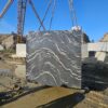 Product Overview: Reliance Titanium Black & Forest Black Granite is a luxurious natural stone celebrated for its striking black background enriched with flowing golden and white veins. Mined from our owned quarry, this granite represents strength, elegance, and timeless beauty — making it a preferred choice for high-end architectural and interior projects across the globe. Each block is a unique creation of nature, offering unmatched character and visual depth. Technical Specifications: Title Reliance Titanium Black & Forest Black Granite Block Stone Type Granite Block Type Gangsaw Block Block Size 300 CM x 180 CM x 180 CM (LXWXH) Color Deep Black with Gold & White Veins Surface Finish Options Wire Saw Cut Density 2960-3000 kg/m3 Compressive Strength 200-250 MPa Water Absorption 0.2%-0.3% Hardness (Mohs) 6 to 7 Porosity Low Origin India Applications Slabs, Countertops, Flooring, Wall Cladding, Interior Key Features: Elegant Aesthetic Appeal: Deep jet-black background enhanced by golden and silver waves — a naturally luxurious look. Superior Strength & Durability: Excellent structural integrity and long-term performance in varied climates. High Polish Retention: Achieves exceptional gloss and mirror-like reflection after finishing. Consistent Texture: Uniform color and grain suitable for large-scale architectural applications. Versatile Application Range: Perfect for multiple interior purposes. Low Maintenance: Resistant to stains, scratches, and moisture, ensuring lasting beauty with minimal upkeep. Export-Grade Blocks: Carefully selected and cut for optimal slab yield and international market standards. Recommended Uses: Kitchen Countertops & Islands Luxury Flooring & Staircases Hotel Lobbies & Reception Areas Wall Cladding & Facades Memorials & Monuments Designer Furniture Tops Why Choose Reliance Titanium Black Granite and Forest Black Granite? Our granite is preferred by export buyers because of: Natural white veins and attractive deep black surface Zero crack, high strength and durability, suitable for projects & reprocessing Consistent Gang Saw block sizes Strict quality checks for each block before shipment Reliable and stable long-term supply Export Capabilities & Payment Terms: We provide smooth, professional export handling with: Payment Options: L/C at sight (Letter of Credit at sight) D/P (Documents Against Payment) T/T advance (if preferred by the buyer) Shipping Documents Provided: Bill of Lading (BL) Commercial Invoice Packing List Certificate of Origin Other documents as per buyer requirements Shipping Price Options: FOB (Indian Port) CNF (any destination port globally) Our logistics team ensures timely loading, documentation, and shipment coordination for a hassle-free experience. About Reliance Mines & Minerals We have a strong presence in the global stone industry, regularly exporting to China, Germany, USA, Oman, and Qatar . Our team is experienced in international trade procedures, ensuring professional communication and smooth cooperation with all partners. We Welcome Your Inquiry If your company is seeking a reliable supplier for premium Titanium black & Forest black granite blocks, we would be pleased to offer quotations, block photos, videos and quarry videos and further details. We look forward to establishing a long-term and successful business relationship with your esteemed company. More About Reliance Titanium Black & Forest Black Granite: Reliance Titanium Black & Forest Black Granite combines natural elegance with engineering excellence. Its bold veins and premium polish bring sophistication to any architectural space, while its robust physical properties ensure durability even in demanding environments. Each block is meticulously extracted and inspected to meet international export quality benchmarks. Reliance Mines & Minerals specializes in the sales and global export of premium granite blocks and slabs. With years of experience in the stone industry, we have established a strong presence in international markets. We are committed to delivering top-quality granite with timely and reliable shipments to major ports worldwide. Our dedicated sales and logistics team is highly skilled in managing export documentation, container loading, and shipping procedures, ensuring a smooth and hassle-free experience for our clients. At the heart of our business is a focus on excellence, professionalism, and customer satisfaction, making us a trusted partner for granite buyers around the globe. 印度 花岗岩 块料 泰坦黑 花岗岩 印度 森林黑 花岗岩 印度 印度 花岗岩 块料, 印度 出口 花岗岩 块, 印度花岗岩原石 中国进口 India granite block Titanium Black granite India Forest Black granite India Granite Blocks Titanium Black Granite Reliance Titanium Black Granite Titanium Black Granite Slabs Polished Titanium Black Granite Bookmatch Titanium Black Granite Titanium Black Granite Exporters India Titanium Black Granite Suppliers Titanium Black Granite Manufacturers Exotic Black Granite with White Veins Deep Black Granite Slabs Mirror Polished Granite Luxury Granite for Interior Walls Natural Stone for Modern Architecture High Gloss Granite Panels Bookmatched Granite Wall Design Black Granite for Hotel Lobby & Flooring Designer Granite Slabs for Projects Indian Granite Exporters Premium Granite from India Granite Slabs for Export Worldwide Granite Supplier Natural Stone Exporter from India Wholesale Granite Supplier Black Granite for Construction & Interiors Architectural Granite Stone Supplier Custom Cut Granite Slabs Export Granite for Wall Cladding Granite for Flooring Granite for Kitchen Countertops Granite for Hotel & Commercial Projects Interior Stone Cladding Luxury Stone for Architects & Designers Black Forest Granite supplier Black Forest Granite manufacturer Black Forest Granite exporter Black Forest Granite quarry Black Forest Granite wholesaler Black Forest Granite seller Buy Black Forest Granite blocks Buy Black Forest Granite slabs Black Forest Granite for flooring Black Forest Granite for countertops Black Forest Granite for wall cladding Black Forest Granite price per sqm Black Forest Granite bulk supplier Black Forest Granite block exporter Black Forest Granite slab manufacturer Black Forest Granite quarry owner Black Forest Granite wholesale price Black Forest Granite large quantity supplier Black Forest Granite custom sizes Black Forest Granite supplier India Black Forest Granite manufacturer India Black Forest Granite exporter India Black Forest Granite quarry India Black Forest Granite supplier [Your City/State] Black Forest Granite international exporter Premium Black Forest Granite supplier Natural Black Forest Granite stone High quality Black Forest Granite slabs Black Forest Granite direct from quarry Black Forest Granite blocks for export Black Forest Granite polished slabs Black granite stone supplier Natural granite stone exporter Indian black granite manufacturer Granite blocks and slabs exporter Dimension stone granite supplier Nebula Wave Granite Stone Manufacturer Export Quality Blocks Supplier Quarry Reliance Mines India Titanium Black Granite Stone Manufacturer Export Quality Blocks Supplier Quarry Reliance Mines India Cosmic Black Granite Stone Manufacturer Export Quality Blocks Supplier Quarry Reliance Mines India Marquina Black Granite Stone Manufacturer Export Quality Blocks Supplier Quarry Reliance Mines India Black Forest Granite Stone Manufacturer Export Quality Blocks Supplier Quarry Reliance Mines India #TitaniumBlackGranite #RelianceGranite #IndianGranite #GraniteExporter #LuxuryGranite #GraniteSupplier #BlackGranite #NaturalStoneIndia #GraniteSlabs #GraniteBookmatch #InteriorDesignStone #ArchitecturalStone #PremiumGranite #GraniteExport #GraniteDesigns #reliancemines #granite #marble #stone #quarry #forestblackgranite