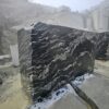 Product Overview: Reliance Titanium Black & Forest Black Granite is a luxurious natural stone celebrated for its striking black background enriched with flowing golden and white veins. Mined from our owned quarry, this granite represents strength, elegance, and timeless beauty — making it a preferred choice for high-end architectural and interior projects across the globe. Each block is a unique creation of nature, offering unmatched character and visual depth. Technical Specifications: Title Reliance Titanium Black & Forest Black Granite Block Stone Type Granite Block Type Gangsaw Block Block Size 300 CM x 180 CM x 180 CM (LXWXH) Color Deep Black with Gold & White Veins Surface Finish Options Wire Saw Cut Density 2960-3000 kg/m3 Compressive Strength 200-250 MPa Water Absorption 0.2%-0.3% Hardness (Mohs) 6 to 7 Porosity Low Origin India Applications Slabs, Countertops, Flooring, Wall Cladding, Interior Key Features: Elegant Aesthetic Appeal: Deep jet-black background enhanced by golden and silver waves — a naturally luxurious look. Superior Strength & Durability: Excellent structural integrity and long-term performance in varied climates. High Polish Retention: Achieves exceptional gloss and mirror-like reflection after finishing. Consistent Texture: Uniform color and grain suitable for large-scale architectural applications. Versatile Application Range: Perfect for multiple interior purposes. Low Maintenance: Resistant to stains, scratches, and moisture, ensuring lasting beauty with minimal upkeep. Export-Grade Blocks: Carefully selected and cut for optimal slab yield and international market standards. Recommended Uses: Kitchen Countertops & Islands Luxury Flooring & Staircases Hotel Lobbies & Reception Areas Wall Cladding & Facades Memorials & Monuments Designer Furniture Tops Why Choose Reliance Titanium Black Granite and Forest Black Granite? Our granite is preferred by export buyers because of: Natural white veins and attractive deep black surface Zero crack, high strength and durability, suitable for projects & reprocessing Consistent Gang Saw block sizes Strict quality checks for each block before shipment Reliable and stable long-term supply Export Capabilities & Payment Terms: We provide smooth, professional export handling with: Payment Options: L/C at sight (Letter of Credit at sight) D/P (Documents Against Payment) T/T advance (if preferred by the buyer) Shipping Documents Provided: Bill of Lading (BL) Commercial Invoice Packing List Certificate of Origin Other documents as per buyer requirements Shipping Price Options: FOB (Indian Port) CNF (any destination port globally) Our logistics team ensures timely loading, documentation, and shipment coordination for a hassle-free experience. About Reliance Mines & Minerals We have a strong presence in the global stone industry, regularly exporting to China, Germany, USA, Oman, and Qatar . Our team is experienced in international trade procedures, ensuring professional communication and smooth cooperation with all partners. We Welcome Your Inquiry If your company is seeking a reliable supplier for premium Titanium black & Forest black granite blocks, we would be pleased to offer quotations, block photos, videos and quarry videos and further details. We look forward to establishing a long-term and successful business relationship with your esteemed company. More About Reliance Titanium Black & Forest Black Granite: Reliance Titanium Black & Forest Black Granite combines natural elegance with engineering excellence. Its bold veins and premium polish bring sophistication to any architectural space, while its robust physical properties ensure durability even in demanding environments. Each block is meticulously extracted and inspected to meet international export quality benchmarks. Reliance Mines & Minerals specializes in the sales and global export of premium granite blocks and slabs. With years of experience in the stone industry, we have established a strong presence in international markets. We are committed to delivering top-quality granite with timely and reliable shipments to major ports worldwide. Our dedicated sales and logistics team is highly skilled in managing export documentation, container loading, and shipping procedures, ensuring a smooth and hassle-free experience for our clients. At the heart of our business is a focus on excellence, professionalism, and customer satisfaction, making us a trusted partner for granite buyers around the globe. 印度 花岗岩 块料 泰坦黑 花岗岩 印度 森林黑 花岗岩 印度 印度 花岗岩 块料, 印度 出口 花岗岩 块, 印度花岗岩原石 中国进口 India granite block Titanium Black granite India Forest Black granite India Granite Blocks Titanium Black Granite Reliance Titanium Black Granite Titanium Black Granite Slabs Polished Titanium Black Granite Bookmatch Titanium Black Granite Titanium Black Granite Exporters India Titanium Black Granite Suppliers Titanium Black Granite Manufacturers Exotic Black Granite with White Veins Deep Black Granite Slabs Mirror Polished Granite Luxury Granite for Interior Walls Natural Stone for Modern Architecture High Gloss Granite Panels Bookmatched Granite Wall Design Black Granite for Hotel Lobby & Flooring Designer Granite Slabs for Projects Indian Granite Exporters Premium Granite from India Granite Slabs for Export Worldwide Granite Supplier Natural Stone Exporter from India Wholesale Granite Supplier Black Granite for Construction & Interiors Architectural Granite Stone Supplier Custom Cut Granite Slabs Export Granite for Wall Cladding Granite for Flooring Granite for Kitchen Countertops Granite for Hotel & Commercial Projects Interior Stone Cladding Luxury Stone for Architects & Designers Black Forest Granite supplier Black Forest Granite manufacturer Black Forest Granite exporter Black Forest Granite quarry Black Forest Granite wholesaler Black Forest Granite seller Buy Black Forest Granite blocks Buy Black Forest Granite slabs Black Forest Granite for flooring Black Forest Granite for countertops Black Forest Granite for wall cladding Black Forest Granite price per sqm Black Forest Granite bulk supplier Black Forest Granite block exporter Black Forest Granite slab manufacturer Black Forest Granite quarry owner Black Forest Granite wholesale price Black Forest Granite large quantity supplier Black Forest Granite custom sizes Black Forest Granite supplier India Black Forest Granite manufacturer India Black Forest Granite exporter India Black Forest Granite quarry India Black Forest Granite supplier [Your City/State] Black Forest Granite international exporter Premium Black Forest Granite supplier Natural Black Forest Granite stone High quality Black Forest Granite slabs Black Forest Granite direct from quarry Black Forest Granite blocks for export Black Forest Granite polished slabs Black granite stone supplier Natural granite stone exporter Indian black granite manufacturer Granite blocks and slabs exporter Dimension stone granite supplier Nebula Wave Granite Stone Manufacturer Export Quality Blocks Supplier Quarry Reliance Mines India Titanium Black Granite Stone Manufacturer Export Quality Blocks Supplier Quarry Reliance Mines India Cosmic Black Granite Stone Manufacturer Export Quality Blocks Supplier Quarry Reliance Mines India Marquina Black Granite Stone Manufacturer Export Quality Blocks Supplier Quarry Reliance Mines India Black Forest Granite Stone Manufacturer Export Quality Blocks Supplier Quarry Reliance Mines India #TitaniumBlackGranite #RelianceGranite #IndianGranite #GraniteExporter #LuxuryGranite #GraniteSupplier #BlackGranite #NaturalStoneIndia #GraniteSlabs #GraniteBookmatch #InteriorDesignStone #ArchitecturalStone #PremiumGranite #GraniteExport #GraniteDesigns #reliancemines #granite #marble #stone #quarry #forestblackgranite