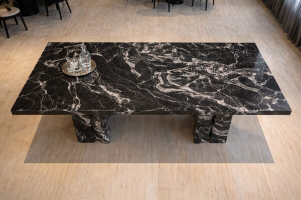 Product Overview: Reliance Titanium Black & Forest Black Granite is a luxurious natural stone celebrated for its striking black background enriched with flowing golden and white veins. Mined from our owned quarry, this granite represents strength, elegance, and timeless beauty — making it a preferred choice for high-end architectural and interior projects across the globe. Each block is a unique creation of nature, offering unmatched character and visual depth. Technical Specifications: Title Reliance Titanium Black & Forest Black Granite Block Stone Type Granite Block Type Gangsaw Block Block Size 300 CM x 180 CM x 180 CM (LXWXH) Color Deep Black with Gold & White Veins Surface Finish Options Wire Saw Cut Density 2960-3000 kg/m3 Compressive Strength 200-250 MPa Water Absorption 0.2%-0.3% Hardness (Mohs) 6 to 7 Porosity Low Origin India Applications Slabs, Countertops, Flooring, Wall Cladding, Interior Key Features: Elegant Aesthetic Appeal: Deep jet-black background enhanced by golden and silver waves — a naturally luxurious look. Superior Strength & Durability: Excellent structural integrity and long-term performance in varied climates. High Polish Retention: Achieves exceptional gloss and mirror-like reflection after finishing. Consistent Texture: Uniform color and grain suitable for large-scale architectural applications. Versatile Application Range: Perfect for multiple interior purposes. Low Maintenance: Resistant to stains, scratches, and moisture, ensuring lasting beauty with minimal upkeep. Export-Grade Blocks: Carefully selected and cut for optimal slab yield and international market standards. Recommended Uses: Kitchen Countertops & Islands Luxury Flooring & Staircases Hotel Lobbies & Reception Areas Wall Cladding & Facades Memorials & Monuments Designer Furniture Tops Why Choose Reliance Titanium Black Granite and Forest Black Granite? Our granite is preferred by export buyers because of: Natural white veins and attractive deep black surface Zero crack, high strength and durability, suitable for projects & reprocessing Consistent Gang Saw block sizes Strict quality checks for each block before shipment Reliable and stable long-term supply Export Capabilities & Payment Terms: We provide smooth, professional export handling with: Payment Options: L/C at sight (Letter of Credit at sight) D/P (Documents Against Payment) T/T advance (if preferred by the buyer) Shipping Documents Provided: Bill of Lading (BL) Commercial Invoice Packing List Certificate of Origin Other documents as per buyer requirements Shipping Price Options: FOB (Indian Port) CNF (any destination port globally) Our logistics team ensures timely loading, documentation, and shipment coordination for a hassle-free experience. About Reliance Mines & Minerals We have a strong presence in the global stone industry, regularly exporting to China, Germany, USA, Oman, and Qatar . Our team is experienced in international trade procedures, ensuring professional communication and smooth cooperation with all partners. We Welcome Your Inquiry If your company is seeking a reliable supplier for premium Titanium black & Forest black granite blocks, we would be pleased to offer quotations, block photos, videos and quarry videos and further details. We look forward to establishing a long-term and successful business relationship with your esteemed company. More About Reliance Titanium Black & Forest Black Granite: Reliance Titanium Black & Forest Black Granite combines natural elegance with engineering excellence. Its bold veins and premium polish bring sophistication to any architectural space, while its robust physical properties ensure durability even in demanding environments. Each block is meticulously extracted and inspected to meet international export quality benchmarks. Reliance Mines & Minerals specializes in the sales and global export of premium granite blocks and slabs. With years of experience in the stone industry, we have established a strong presence in international markets. We are committed to delivering top-quality granite with timely and reliable shipments to major ports worldwide. Our dedicated sales and logistics team is highly skilled in managing export documentation, container loading, and shipping procedures, ensuring a smooth and hassle-free experience for our clients. At the heart of our business is a focus on excellence, professionalism, and customer satisfaction, making us a trusted partner for granite buyers around the globe. 印度 花岗岩 块料 泰坦黑 花岗岩 印度 森林黑 花岗岩 印度 印度 花岗岩 块料, 印度 出口 花岗岩 块, 印度花岗岩原石 中国进口 India granite block Titanium Black granite India Forest Black granite India Granite Blocks Titanium Black Granite Reliance Titanium Black Granite Titanium Black Granite Slabs Polished Titanium Black Granite Bookmatch Titanium Black Granite Titanium Black Granite Exporters India Titanium Black Granite Suppliers Titanium Black Granite Manufacturers Exotic Black Granite with White Veins Deep Black Granite Slabs Mirror Polished Granite Luxury Granite for Interior Walls Natural Stone for Modern Architecture High Gloss Granite Panels Bookmatched Granite Wall Design Black Granite for Hotel Lobby & Flooring Designer Granite Slabs for Projects Indian Granite Exporters Premium Granite from India Granite Slabs for Export Worldwide Granite Supplier Natural Stone Exporter from India Wholesale Granite Supplier Black Granite for Construction & Interiors Architectural Granite Stone Supplier Custom Cut Granite Slabs Export Granite for Wall Cladding Granite for Flooring Granite for Kitchen Countertops Granite for Hotel & Commercial Projects Interior Stone Cladding Luxury Stone for Architects & Designers Black Forest Granite supplier Black Forest Granite manufacturer Black Forest Granite exporter Black Forest Granite quarry Black Forest Granite wholesaler Black Forest Granite seller Buy Black Forest Granite blocks Buy Black Forest Granite slabs Black Forest Granite for flooring Black Forest Granite for countertops Black Forest Granite for wall cladding Black Forest Granite price per sqm Black Forest Granite bulk supplier Black Forest Granite block exporter Black Forest Granite slab manufacturer Black Forest Granite quarry owner Black Forest Granite wholesale price Black Forest Granite large quantity supplier Black Forest Granite custom sizes Black Forest Granite supplier India Black Forest Granite manufacturer India Black Forest Granite exporter India Black Forest Granite quarry India Black Forest Granite supplier [Your City/State] Black Forest Granite international exporter Premium Black Forest Granite supplier Natural Black Forest Granite stone High quality Black Forest Granite slabs Black Forest Granite direct from quarry Black Forest Granite blocks for export Black Forest Granite polished slabs Black granite stone supplier Natural granite stone exporter Indian black granite manufacturer Granite blocks and slabs exporter Dimension stone granite supplier Nebula Wave Granite Stone Manufacturer Export Quality Blocks Supplier Quarry Reliance Mines India Titanium Black Granite Stone Manufacturer Export Quality Blocks Supplier Quarry Reliance Mines India Cosmic Black Granite Stone Manufacturer Export Quality Blocks Supplier Quarry Reliance Mines India Marquina Black Granite Stone Manufacturer Export Quality Blocks Supplier Quarry Reliance Mines India Black Forest Granite Stone Manufacturer Export Quality Blocks Supplier Quarry Reliance Mines India #TitaniumBlackGranite #RelianceGranite #IndianGranite #GraniteExporter #LuxuryGranite #GraniteSupplier #BlackGranite #NaturalStoneIndia #GraniteSlabs #GraniteBookmatch #InteriorDesignStone #ArchitecturalStone #PremiumGranite #GraniteExport #GraniteDesigns #reliancemines #granite #marble #stone #quarry #forestblackgranite
