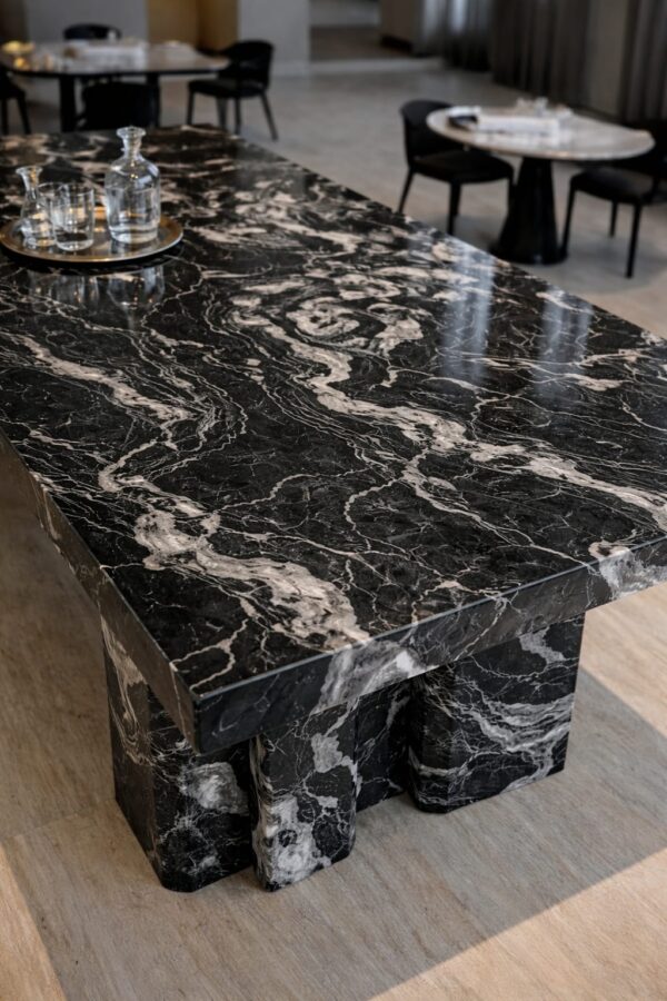 Product Overview: Reliance Titanium Black & Forest Black Granite is a luxurious natural stone celebrated for its striking black background enriched with flowing golden and white veins. Mined from our owned quarry, this granite represents strength, elegance, and timeless beauty — making it a preferred choice for high-end architectural and interior projects across the globe. Each block is a unique creation of nature, offering unmatched character and visual depth. Technical Specifications: Title Reliance Titanium Black & Forest Black Granite Block Stone Type Granite Block Type Gangsaw Block Block Size 300 CM x 180 CM x 180 CM (LXWXH) Color Deep Black with Gold & White Veins Surface Finish Options Wire Saw Cut Density 2960-3000 kg/m3 Compressive Strength 200-250 MPa Water Absorption 0.2%-0.3% Hardness (Mohs) 6 to 7 Porosity Low Origin India Applications Slabs, Countertops, Flooring, Wall Cladding, Interior Key Features: Elegant Aesthetic Appeal: Deep jet-black background enhanced by golden and silver waves — a naturally luxurious look. Superior Strength & Durability: Excellent structural integrity and long-term performance in varied climates. High Polish Retention: Achieves exceptional gloss and mirror-like reflection after finishing. Consistent Texture: Uniform color and grain suitable for large-scale architectural applications. Versatile Application Range: Perfect for multiple interior purposes. Low Maintenance: Resistant to stains, scratches, and moisture, ensuring lasting beauty with minimal upkeep. Export-Grade Blocks: Carefully selected and cut for optimal slab yield and international market standards. Recommended Uses: Kitchen Countertops & Islands Luxury Flooring & Staircases Hotel Lobbies & Reception Areas Wall Cladding & Facades Memorials & Monuments Designer Furniture Tops Why Choose Reliance Titanium Black Granite and Forest Black Granite? Our granite is preferred by export buyers because of: Natural white veins and attractive deep black surface Zero crack, high strength and durability, suitable for projects & reprocessing Consistent Gang Saw block sizes Strict quality checks for each block before shipment Reliable and stable long-term supply Export Capabilities & Payment Terms: We provide smooth, professional export handling with: Payment Options: L/C at sight (Letter of Credit at sight) D/P (Documents Against Payment) T/T advance (if preferred by the buyer) Shipping Documents Provided: Bill of Lading (BL) Commercial Invoice Packing List Certificate of Origin Other documents as per buyer requirements Shipping Price Options: FOB (Indian Port) CNF (any destination port globally) Our logistics team ensures timely loading, documentation, and shipment coordination for a hassle-free experience. About Reliance Mines & Minerals We have a strong presence in the global stone industry, regularly exporting to China, Germany, USA, Oman, and Qatar . Our team is experienced in international trade procedures, ensuring professional communication and smooth cooperation with all partners. We Welcome Your Inquiry If your company is seeking a reliable supplier for premium Titanium black & Forest black granite blocks, we would be pleased to offer quotations, block photos, videos and quarry videos and further details. We look forward to establishing a long-term and successful business relationship with your esteemed company. More About Reliance Titanium Black & Forest Black Granite: Reliance Titanium Black & Forest Black Granite combines natural elegance with engineering excellence. Its bold veins and premium polish bring sophistication to any architectural space, while its robust physical properties ensure durability even in demanding environments. Each block is meticulously extracted and inspected to meet international export quality benchmarks. Reliance Mines & Minerals specializes in the sales and global export of premium granite blocks and slabs. With years of experience in the stone industry, we have established a strong presence in international markets. We are committed to delivering top-quality granite with timely and reliable shipments to major ports worldwide. Our dedicated sales and logistics team is highly skilled in managing export documentation, container loading, and shipping procedures, ensuring a smooth and hassle-free experience for our clients. At the heart of our business is a focus on excellence, professionalism, and customer satisfaction, making us a trusted partner for granite buyers around the globe. 印度 花岗岩 块料 泰坦黑 花岗岩 印度 森林黑 花岗岩 印度 印度 花岗岩 块料, 印度 出口 花岗岩 块, 印度花岗岩原石 中国进口 India granite block Titanium Black granite India Forest Black granite India Granite Blocks Titanium Black Granite Reliance Titanium Black Granite Titanium Black Granite Slabs Polished Titanium Black Granite Bookmatch Titanium Black Granite Titanium Black Granite Exporters India Titanium Black Granite Suppliers Titanium Black Granite Manufacturers Exotic Black Granite with White Veins Deep Black Granite Slabs Mirror Polished Granite Luxury Granite for Interior Walls Natural Stone for Modern Architecture High Gloss Granite Panels Bookmatched Granite Wall Design Black Granite for Hotel Lobby & Flooring Designer Granite Slabs for Projects Indian Granite Exporters Premium Granite from India Granite Slabs for Export Worldwide Granite Supplier Natural Stone Exporter from India Wholesale Granite Supplier Black Granite for Construction & Interiors Architectural Granite Stone Supplier Custom Cut Granite Slabs Export Granite for Wall Cladding Granite for Flooring Granite for Kitchen Countertops Granite for Hotel & Commercial Projects Interior Stone Cladding Luxury Stone for Architects & Designers Black Forest Granite supplier Black Forest Granite manufacturer Black Forest Granite exporter Black Forest Granite quarry Black Forest Granite wholesaler Black Forest Granite seller Buy Black Forest Granite blocks Buy Black Forest Granite slabs Black Forest Granite for flooring Black Forest Granite for countertops Black Forest Granite for wall cladding Black Forest Granite price per sqm Black Forest Granite bulk supplier Black Forest Granite block exporter Black Forest Granite slab manufacturer Black Forest Granite quarry owner Black Forest Granite wholesale price Black Forest Granite large quantity supplier Black Forest Granite custom sizes Black Forest Granite supplier India Black Forest Granite manufacturer India Black Forest Granite exporter India Black Forest Granite quarry India Black Forest Granite supplier [Your City/State] Black Forest Granite international exporter Premium Black Forest Granite supplier Natural Black Forest Granite stone High quality Black Forest Granite slabs Black Forest Granite direct from quarry Black Forest Granite blocks for export Black Forest Granite polished slabs Black granite stone supplier Natural granite stone exporter Indian black granite manufacturer Granite blocks and slabs exporter Dimension stone granite supplier Nebula Wave Granite Stone Manufacturer Export Quality Blocks Supplier Quarry Reliance Mines India Titanium Black Granite Stone Manufacturer Export Quality Blocks Supplier Quarry Reliance Mines India Cosmic Black Granite Stone Manufacturer Export Quality Blocks Supplier Quarry Reliance Mines India Marquina Black Granite Stone Manufacturer Export Quality Blocks Supplier Quarry Reliance Mines India Black Forest Granite Stone Manufacturer Export Quality Blocks Supplier Quarry Reliance Mines India #TitaniumBlackGranite #RelianceGranite #IndianGranite #GraniteExporter #LuxuryGranite #GraniteSupplier #BlackGranite #NaturalStoneIndia #GraniteSlabs #GraniteBookmatch #InteriorDesignStone #ArchitecturalStone #PremiumGranite #GraniteExport #GraniteDesigns #reliancemines #granite #marble #stone #quarry #forestblackgranite