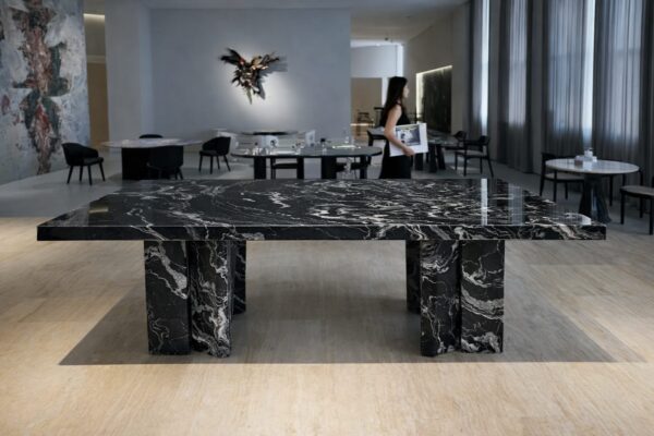 Product Overview: Reliance Titanium Black & Forest Black Granite is a luxurious natural stone celebrated for its striking black background enriched with flowing golden and white veins. Mined from our owned quarry, this granite represents strength, elegance, and timeless beauty — making it a preferred choice for high-end architectural and interior projects across the globe. Each block is a unique creation of nature, offering unmatched character and visual depth. Technical Specifications: Title Reliance Titanium Black & Forest Black Granite Block Stone Type Granite Block Type Gangsaw Block Block Size 300 CM x 180 CM x 180 CM (LXWXH) Color Deep Black with Gold & White Veins Surface Finish Options Wire Saw Cut Density 2960-3000 kg/m3 Compressive Strength 200-250 MPa Water Absorption 0.2%-0.3% Hardness (Mohs) 6 to 7 Porosity Low Origin India Applications Slabs, Countertops, Flooring, Wall Cladding, Interior Key Features: Elegant Aesthetic Appeal: Deep jet-black background enhanced by golden and silver waves — a naturally luxurious look. Superior Strength & Durability: Excellent structural integrity and long-term performance in varied climates. High Polish Retention: Achieves exceptional gloss and mirror-like reflection after finishing. Consistent Texture: Uniform color and grain suitable for large-scale architectural applications. Versatile Application Range: Perfect for multiple interior purposes. Low Maintenance: Resistant to stains, scratches, and moisture, ensuring lasting beauty with minimal upkeep. Export-Grade Blocks: Carefully selected and cut for optimal slab yield and international market standards. Recommended Uses: Kitchen Countertops & Islands Luxury Flooring & Staircases Hotel Lobbies & Reception Areas Wall Cladding & Facades Memorials & Monuments Designer Furniture Tops Why Choose Reliance Titanium Black Granite and Forest Black Granite? Our granite is preferred by export buyers because of: Natural white veins and attractive deep black surface Zero crack, high strength and durability, suitable for projects & reprocessing Consistent Gang Saw block sizes Strict quality checks for each block before shipment Reliable and stable long-term supply Export Capabilities & Payment Terms: We provide smooth, professional export handling with: Payment Options: L/C at sight (Letter of Credit at sight) D/P (Documents Against Payment) T/T advance (if preferred by the buyer) Shipping Documents Provided: Bill of Lading (BL) Commercial Invoice Packing List Certificate of Origin Other documents as per buyer requirements Shipping Price Options: FOB (Indian Port) CNF (any destination port globally) Our logistics team ensures timely loading, documentation, and shipment coordination for a hassle-free experience. About Reliance Mines & Minerals We have a strong presence in the global stone industry, regularly exporting to China, Germany, USA, Oman, and Qatar . Our team is experienced in international trade procedures, ensuring professional communication and smooth cooperation with all partners. We Welcome Your Inquiry If your company is seeking a reliable supplier for premium Titanium black & Forest black granite blocks, we would be pleased to offer quotations, block photos, videos and quarry videos and further details. We look forward to establishing a long-term and successful business relationship with your esteemed company. More About Reliance Titanium Black & Forest Black Granite: Reliance Titanium Black & Forest Black Granite combines natural elegance with engineering excellence. Its bold veins and premium polish bring sophistication to any architectural space, while its robust physical properties ensure durability even in demanding environments. Each block is meticulously extracted and inspected to meet international export quality benchmarks. Reliance Mines & Minerals specializes in the sales and global export of premium granite blocks and slabs. With years of experience in the stone industry, we have established a strong presence in international markets. We are committed to delivering top-quality granite with timely and reliable shipments to major ports worldwide. Our dedicated sales and logistics team is highly skilled in managing export documentation, container loading, and shipping procedures, ensuring a smooth and hassle-free experience for our clients. At the heart of our business is a focus on excellence, professionalism, and customer satisfaction, making us a trusted partner for granite buyers around the globe. 印度 花岗岩 块料 泰坦黑 花岗岩 印度 森林黑 花岗岩 印度 印度 花岗岩 块料, 印度 出口 花岗岩 块, 印度花岗岩原石 中国进口 India granite block Titanium Black granite India Forest Black granite India Granite Blocks Titanium Black Granite Reliance Titanium Black Granite Titanium Black Granite Slabs Polished Titanium Black Granite Bookmatch Titanium Black Granite Titanium Black Granite Exporters India Titanium Black Granite Suppliers Titanium Black Granite Manufacturers Exotic Black Granite with White Veins Deep Black Granite Slabs Mirror Polished Granite Luxury Granite for Interior Walls Natural Stone for Modern Architecture High Gloss Granite Panels Bookmatched Granite Wall Design Black Granite for Hotel Lobby & Flooring Designer Granite Slabs for Projects Indian Granite Exporters Premium Granite from India Granite Slabs for Export Worldwide Granite Supplier Natural Stone Exporter from India Wholesale Granite Supplier Black Granite for Construction & Interiors Architectural Granite Stone Supplier Custom Cut Granite Slabs Export Granite for Wall Cladding Granite for Flooring Granite for Kitchen Countertops Granite for Hotel & Commercial Projects Interior Stone Cladding Luxury Stone for Architects & Designers Black Forest Granite supplier Black Forest Granite manufacturer Black Forest Granite exporter Black Forest Granite quarry Black Forest Granite wholesaler Black Forest Granite seller Buy Black Forest Granite blocks Buy Black Forest Granite slabs Black Forest Granite for flooring Black Forest Granite for countertops Black Forest Granite for wall cladding Black Forest Granite price per sqm Black Forest Granite bulk supplier Black Forest Granite block exporter Black Forest Granite slab manufacturer Black Forest Granite quarry owner Black Forest Granite wholesale price Black Forest Granite large quantity supplier Black Forest Granite custom sizes Black Forest Granite supplier India Black Forest Granite manufacturer India Black Forest Granite exporter India Black Forest Granite quarry India Black Forest Granite supplier [Your City/State] Black Forest Granite international exporter Premium Black Forest Granite supplier Natural Black Forest Granite stone High quality Black Forest Granite slabs Black Forest Granite direct from quarry Black Forest Granite blocks for export Black Forest Granite polished slabs Black granite stone supplier Natural granite stone exporter Indian black granite manufacturer Granite blocks and slabs exporter Dimension stone granite supplier Nebula Wave Granite Stone Manufacturer Export Quality Blocks Supplier Quarry Reliance Mines India Titanium Black Granite Stone Manufacturer Export Quality Blocks Supplier Quarry Reliance Mines India Cosmic Black Granite Stone Manufacturer Export Quality Blocks Supplier Quarry Reliance Mines India Marquina Black Granite Stone Manufacturer Export Quality Blocks Supplier Quarry Reliance Mines India Black Forest Granite Stone Manufacturer Export Quality Blocks Supplier Quarry Reliance Mines India #TitaniumBlackGranite #RelianceGranite #IndianGranite #GraniteExporter #LuxuryGranite #GraniteSupplier #BlackGranite #NaturalStoneIndia #GraniteSlabs #GraniteBookmatch #InteriorDesignStone #ArchitecturalStone #PremiumGranite #GraniteExport #GraniteDesigns #reliancemines #granite #marble #stone #quarry #forestblackgranite