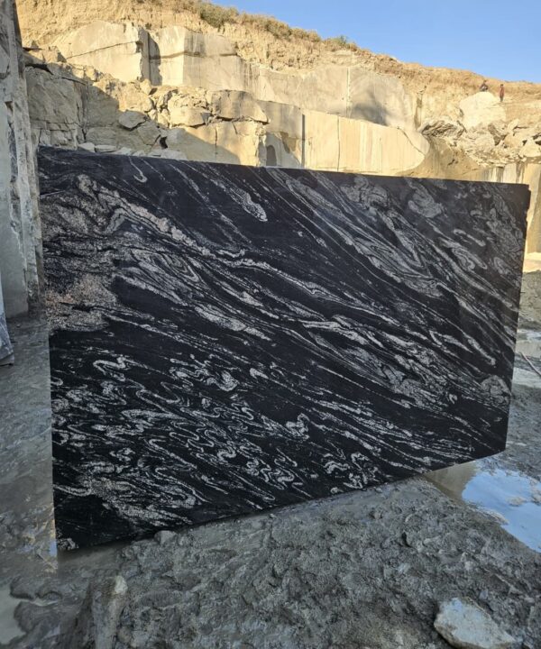 Product Overview: Reliance Titanium Black & Forest Black Granite is a luxurious natural stone celebrated for its striking black background enriched with flowing golden and white veins. Mined from our owned quarry, this granite represents strength, elegance, and timeless beauty — making it a preferred choice for high-end architectural and interior projects across the globe. Each block is a unique creation of nature, offering unmatched character and visual depth. Technical Specifications: Title Reliance Titanium Black & Forest Black Granite Block Stone Type Granite Block Type Gangsaw Block Block Size 300 CM x 180 CM x 180 CM (LXWXH) Color Deep Black with Gold & White Veins Surface Finish Options Wire Saw Cut Density 2960-3000 kg/m3 Compressive Strength 200-250 MPa Water Absorption 0.2%-0.3% Hardness (Mohs) 6 to 7 Porosity Low Origin India Applications Slabs, Countertops, Flooring, Wall Cladding, Interior Key Features: Elegant Aesthetic Appeal: Deep jet-black background enhanced by golden and silver waves — a naturally luxurious look. Superior Strength & Durability: Excellent structural integrity and long-term performance in varied climates. High Polish Retention: Achieves exceptional gloss and mirror-like reflection after finishing. Consistent Texture: Uniform color and grain suitable for large-scale architectural applications. Versatile Application Range: Perfect for multiple interior purposes. Low Maintenance: Resistant to stains, scratches, and moisture, ensuring lasting beauty with minimal upkeep. Export-Grade Blocks: Carefully selected and cut for optimal slab yield and international market standards. Recommended Uses: Kitchen Countertops & Islands Luxury Flooring & Staircases Hotel Lobbies & Reception Areas Wall Cladding & Facades Memorials & Monuments Designer Furniture Tops Why Choose Reliance Titanium Black Granite and Forest Black Granite? Our granite is preferred by export buyers because of: Natural white veins and attractive deep black surface Zero crack, high strength and durability, suitable for projects & reprocessing Consistent Gang Saw block sizes Strict quality checks for each block before shipment Reliable and stable long-term supply Export Capabilities & Payment Terms: We provide smooth, professional export handling with: Payment Options: L/C at sight (Letter of Credit at sight) D/P (Documents Against Payment) T/T advance (if preferred by the buyer) Shipping Documents Provided: Bill of Lading (BL) Commercial Invoice Packing List Certificate of Origin Other documents as per buyer requirements Shipping Price Options: FOB (Indian Port) CNF (any destination port globally) Our logistics team ensures timely loading, documentation, and shipment coordination for a hassle-free experience. About Reliance Mines & Minerals We have a strong presence in the global stone industry, regularly exporting to China, Germany, USA, Oman, and Qatar . Our team is experienced in international trade procedures, ensuring professional communication and smooth cooperation with all partners. We Welcome Your Inquiry If your company is seeking a reliable supplier for premium Titanium black & Forest black granite blocks, we would be pleased to offer quotations, block photos, videos and quarry videos and further details. We look forward to establishing a long-term and successful business relationship with your esteemed company. More About Reliance Titanium Black & Forest Black Granite: Reliance Titanium Black & Forest Black Granite combines natural elegance with engineering excellence. Its bold veins and premium polish bring sophistication to any architectural space, while its robust physical properties ensure durability even in demanding environments. Each block is meticulously extracted and inspected to meet international export quality benchmarks. Reliance Mines & Minerals specializes in the sales and global export of premium granite blocks and slabs. With years of experience in the stone industry, we have established a strong presence in international markets. We are committed to delivering top-quality granite with timely and reliable shipments to major ports worldwide. Our dedicated sales and logistics team is highly skilled in managing export documentation, container loading, and shipping procedures, ensuring a smooth and hassle-free experience for our clients. At the heart of our business is a focus on excellence, professionalism, and customer satisfaction, making us a trusted partner for granite buyers around the globe. 印度 花岗岩 块料 泰坦黑 花岗岩 印度 森林黑 花岗岩 印度 印度 花岗岩 块料, 印度 出口 花岗岩 块, 印度花岗岩原石 中国进口 India granite block Titanium Black granite India Forest Black granite India Granite Blocks Titanium Black Granite Reliance Titanium Black Granite Titanium Black Granite Slabs Polished Titanium Black Granite Bookmatch Titanium Black Granite Titanium Black Granite Exporters India Titanium Black Granite Suppliers Titanium Black Granite Manufacturers Exotic Black Granite with White Veins Deep Black Granite Slabs Mirror Polished Granite Luxury Granite for Interior Walls Natural Stone for Modern Architecture High Gloss Granite Panels Bookmatched Granite Wall Design Black Granite for Hotel Lobby & Flooring Designer Granite Slabs for Projects Indian Granite Exporters Premium Granite from India Granite Slabs for Export Worldwide Granite Supplier Natural Stone Exporter from India Wholesale Granite Supplier Black Granite for Construction & Interiors Architectural Granite Stone Supplier Custom Cut Granite Slabs Export Granite for Wall Cladding Granite for Flooring Granite for Kitchen Countertops Granite for Hotel & Commercial Projects Interior Stone Cladding Luxury Stone for Architects & Designers Black Forest Granite supplier Black Forest Granite manufacturer Black Forest Granite exporter Black Forest Granite quarry Black Forest Granite wholesaler Black Forest Granite seller Buy Black Forest Granite blocks Buy Black Forest Granite slabs Black Forest Granite for flooring Black Forest Granite for countertops Black Forest Granite for wall cladding Black Forest Granite price per sqm Black Forest Granite bulk supplier Black Forest Granite block exporter Black Forest Granite slab manufacturer Black Forest Granite quarry owner Black Forest Granite wholesale price Black Forest Granite large quantity supplier Black Forest Granite custom sizes Black Forest Granite supplier India Black Forest Granite manufacturer India Black Forest Granite exporter India Black Forest Granite quarry India Black Forest Granite supplier [Your City/State] Black Forest Granite international exporter Premium Black Forest Granite supplier Natural Black Forest Granite stone High quality Black Forest Granite slabs Black Forest Granite direct from quarry Black Forest Granite blocks for export Black Forest Granite polished slabs Black granite stone supplier Natural granite stone exporter Indian black granite manufacturer Granite blocks and slabs exporter Dimension stone granite supplier Nebula Wave Granite Stone Manufacturer Export Quality Blocks Supplier Quarry Reliance Mines India Titanium Black Granite Stone Manufacturer Export Quality Blocks Supplier Quarry Reliance Mines India Cosmic Black Granite Stone Manufacturer Export Quality Blocks Supplier Quarry Reliance Mines India Marquina Black Granite Stone Manufacturer Export Quality Blocks Supplier Quarry Reliance Mines India Black Forest Granite Stone Manufacturer Export Quality Blocks Supplier Quarry Reliance Mines India #TitaniumBlackGranite #RelianceGranite #IndianGranite #GraniteExporter #LuxuryGranite #GraniteSupplier #BlackGranite #NaturalStoneIndia #GraniteSlabs #GraniteBookmatch #InteriorDesignStone #ArchitecturalStone #PremiumGranite #GraniteExport #GraniteDesigns #reliancemines #granite #marble #stone #quarry #forestblackgranite