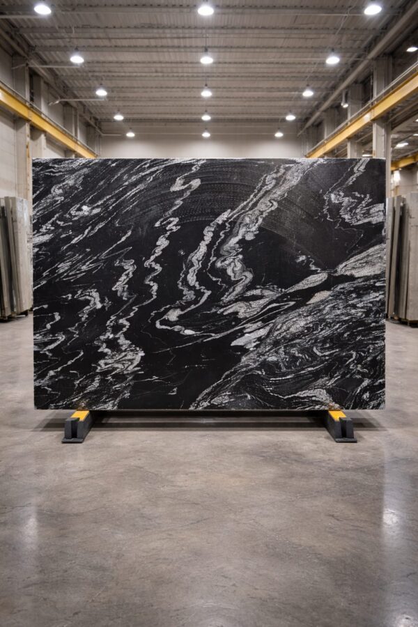 Product Overview: Reliance Titanium Black & Forest Black Granite is a luxurious natural stone celebrated for its striking black background enriched with flowing golden and white veins. Mined from our owned quarry, this granite represents strength, elegance, and timeless beauty — making it a preferred choice for high-end architectural and interior projects across the globe. Each block is a unique creation of nature, offering unmatched character and visual depth. Technical Specifications: Title Reliance Titanium Black & Forest Black Granite Block Stone Type Granite Block Type Gangsaw Block Block Size 300 CM x 180 CM x 180 CM (LXWXH) Color Deep Black with Gold & White Veins Surface Finish Options Wire Saw Cut Density 2960-3000 kg/m3 Compressive Strength 200-250 MPa Water Absorption 0.2%-0.3% Hardness (Mohs) 6 to 7 Porosity Low Origin India Applications Slabs, Countertops, Flooring, Wall Cladding, Interior Key Features: Elegant Aesthetic Appeal: Deep jet-black background enhanced by golden and silver waves — a naturally luxurious look. Superior Strength & Durability: Excellent structural integrity and long-term performance in varied climates. High Polish Retention: Achieves exceptional gloss and mirror-like reflection after finishing. Consistent Texture: Uniform color and grain suitable for large-scale architectural applications. Versatile Application Range: Perfect for multiple interior purposes. Low Maintenance: Resistant to stains, scratches, and moisture, ensuring lasting beauty with minimal upkeep. Export-Grade Blocks: Carefully selected and cut for optimal slab yield and international market standards. Recommended Uses: Kitchen Countertops & Islands Luxury Flooring & Staircases Hotel Lobbies & Reception Areas Wall Cladding & Facades Memorials & Monuments Designer Furniture Tops Why Choose Reliance Titanium Black Granite and Forest Black Granite? Our granite is preferred by export buyers because of: Natural white veins and attractive deep black surface Zero crack, high strength and durability, suitable for projects & reprocessing Consistent Gang Saw block sizes Strict quality checks for each block before shipment Reliable and stable long-term supply Export Capabilities & Payment Terms: We provide smooth, professional export handling with: Payment Options: L/C at sight (Letter of Credit at sight) D/P (Documents Against Payment) T/T advance (if preferred by the buyer) Shipping Documents Provided: Bill of Lading (BL) Commercial Invoice Packing List Certificate of Origin Other documents as per buyer requirements Shipping Price Options: FOB (Indian Port) CNF (any destination port globally) Our logistics team ensures timely loading, documentation, and shipment coordination for a hassle-free experience. About Reliance Mines & Minerals We have a strong presence in the global stone industry, regularly exporting to China, Germany, USA, Oman, and Qatar . Our team is experienced in international trade procedures, ensuring professional communication and smooth cooperation with all partners. We Welcome Your Inquiry If your company is seeking a reliable supplier for premium Titanium black & Forest black granite blocks, we would be pleased to offer quotations, block photos, videos and quarry videos and further details. We look forward to establishing a long-term and successful business relationship with your esteemed company. More About Reliance Titanium Black & Forest Black Granite: Reliance Titanium Black & Forest Black Granite combines natural elegance with engineering excellence. Its bold veins and premium polish bring sophistication to any architectural space, while its robust physical properties ensure durability even in demanding environments. Each block is meticulously extracted and inspected to meet international export quality benchmarks. Reliance Mines & Minerals specializes in the sales and global export of premium granite blocks and slabs. With years of experience in the stone industry, we have established a strong presence in international markets. We are committed to delivering top-quality granite with timely and reliable shipments to major ports worldwide. Our dedicated sales and logistics team is highly skilled in managing export documentation, container loading, and shipping procedures, ensuring a smooth and hassle-free experience for our clients. At the heart of our business is a focus on excellence, professionalism, and customer satisfaction, making us a trusted partner for granite buyers around the globe. 印度 花岗岩 块料 泰坦黑 花岗岩 印度 森林黑 花岗岩 印度 印度 花岗岩 块料, 印度 出口 花岗岩 块, 印度花岗岩原石 中国进口 India granite block Titanium Black granite India Forest Black granite India Granite Blocks Titanium Black Granite Reliance Titanium Black Granite Titanium Black Granite Slabs Polished Titanium Black Granite Bookmatch Titanium Black Granite Titanium Black Granite Exporters India Titanium Black Granite Suppliers Titanium Black Granite Manufacturers Exotic Black Granite with White Veins Deep Black Granite Slabs Mirror Polished Granite Luxury Granite for Interior Walls Natural Stone for Modern Architecture High Gloss Granite Panels Bookmatched Granite Wall Design Black Granite for Hotel Lobby & Flooring Designer Granite Slabs for Projects Indian Granite Exporters Premium Granite from India Granite Slabs for Export Worldwide Granite Supplier Natural Stone Exporter from India Wholesale Granite Supplier Black Granite for Construction & Interiors Architectural Granite Stone Supplier Custom Cut Granite Slabs Export Granite for Wall Cladding Granite for Flooring Granite for Kitchen Countertops Granite for Hotel & Commercial Projects Interior Stone Cladding Luxury Stone for Architects & Designers Black Forest Granite supplier Black Forest Granite manufacturer Black Forest Granite exporter Black Forest Granite quarry Black Forest Granite wholesaler Black Forest Granite seller Buy Black Forest Granite blocks Buy Black Forest Granite slabs Black Forest Granite for flooring Black Forest Granite for countertops Black Forest Granite for wall cladding Black Forest Granite price per sqm Black Forest Granite bulk supplier Black Forest Granite block exporter Black Forest Granite slab manufacturer Black Forest Granite quarry owner Black Forest Granite wholesale price Black Forest Granite large quantity supplier Black Forest Granite custom sizes Black Forest Granite supplier India Black Forest Granite manufacturer India Black Forest Granite exporter India Black Forest Granite quarry India Black Forest Granite supplier [Your City/State] Black Forest Granite international exporter Premium Black Forest Granite supplier Natural Black Forest Granite stone High quality Black Forest Granite slabs Black Forest Granite direct from quarry Black Forest Granite blocks for export Black Forest Granite polished slabs Black granite stone supplier Natural granite stone exporter Indian black granite manufacturer Granite blocks and slabs exporter Dimension stone granite supplier Nebula Wave Granite Stone Manufacturer Export Quality Blocks Supplier Quarry Reliance Mines India Titanium Black Granite Stone Manufacturer Export Quality Blocks Supplier Quarry Reliance Mines India Cosmic Black Granite Stone Manufacturer Export Quality Blocks Supplier Quarry Reliance Mines India Marquina Black Granite Stone Manufacturer Export Quality Blocks Supplier Quarry Reliance Mines India Black Forest Granite Stone Manufacturer Export Quality Blocks Supplier Quarry Reliance Mines India #TitaniumBlackGranite #RelianceGranite #IndianGranite #GraniteExporter #LuxuryGranite #GraniteSupplier #BlackGranite #NaturalStoneIndia #GraniteSlabs #GraniteBookmatch #InteriorDesignStone #ArchitecturalStone #PremiumGranite #GraniteExport #GraniteDesigns #reliancemines #granite #marble #stone #quarry #forestblackgranite