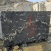 Product Overview: Reliance Titanium Black & Forest Black Granite is a luxurious natural stone celebrated for its striking black background enriched with flowing golden and white veins. Mined from our owned quarry, this granite represents strength, elegance, and timeless beauty — making it a preferred choice for high-end architectural and interior projects across the globe. Each block is a unique creation of nature, offering unmatched character and visual depth. Technical Specifications: Title Reliance Titanium Black & Forest Black Granite Block Stone Type Granite Block Type Gangsaw Block Block Size 300 CM x 180 CM x 180 CM (LXWXH) Color Deep Black with Gold & White Veins Surface Finish Options Wire Saw Cut Density 2960-3000 kg/m3 Compressive Strength 200-250 MPa Water Absorption 0.2%-0.3% Hardness (Mohs) 6 to 7 Porosity Low Origin India Applications Slabs, Countertops, Flooring, Wall Cladding, Interior Key Features: Elegant Aesthetic Appeal: Deep jet-black background enhanced by golden and silver waves — a naturally luxurious look. Superior Strength & Durability: Excellent structural integrity and long-term performance in varied climates. High Polish Retention: Achieves exceptional gloss and mirror-like reflection after finishing. Consistent Texture: Uniform color and grain suitable for large-scale architectural applications. Versatile Application Range: Perfect for multiple interior purposes. Low Maintenance: Resistant to stains, scratches, and moisture, ensuring lasting beauty with minimal upkeep. Export-Grade Blocks: Carefully selected and cut for optimal slab yield and international market standards. Recommended Uses: Kitchen Countertops & Islands Luxury Flooring & Staircases Hotel Lobbies & Reception Areas Wall Cladding & Facades Memorials & Monuments Designer Furniture Tops Why Choose Reliance Titanium Black Granite and Forest Black Granite? Our granite is preferred by export buyers because of: Natural white veins and attractive deep black surface Zero crack, high strength and durability, suitable for projects & reprocessing Consistent Gang Saw block sizes Strict quality checks for each block before shipment Reliable and stable long-term supply Export Capabilities & Payment Terms: We provide smooth, professional export handling with: Payment Options: L/C at sight (Letter of Credit at sight) D/P (Documents Against Payment) T/T advance (if preferred by the buyer) Shipping Documents Provided: Bill of Lading (BL) Commercial Invoice Packing List Certificate of Origin Other documents as per buyer requirements Shipping Price Options: FOB (Indian Port) CNF (any destination port globally) Our logistics team ensures timely loading, documentation, and shipment coordination for a hassle-free experience. About Reliance Mines & Minerals We have a strong presence in the global stone industry, regularly exporting to China, Germany, USA, Oman, and Qatar . Our team is experienced in international trade procedures, ensuring professional communication and smooth cooperation with all partners. We Welcome Your Inquiry If your company is seeking a reliable supplier for premium Titanium black & Forest black granite blocks, we would be pleased to offer quotations, block photos, videos and quarry videos and further details. We look forward to establishing a long-term and successful business relationship with your esteemed company. More About Reliance Titanium Black & Forest Black Granite: Reliance Titanium Black & Forest Black Granite combines natural elegance with engineering excellence. Its bold veins and premium polish bring sophistication to any architectural space, while its robust physical properties ensure durability even in demanding environments. Each block is meticulously extracted and inspected to meet international export quality benchmarks. Reliance Mines & Minerals specializes in the sales and global export of premium granite blocks and slabs. With years of experience in the stone industry, we have established a strong presence in international markets. We are committed to delivering top-quality granite with timely and reliable shipments to major ports worldwide. Our dedicated sales and logistics team is highly skilled in managing export documentation, container loading, and shipping procedures, ensuring a smooth and hassle-free experience for our clients. At the heart of our business is a focus on excellence, professionalism, and customer satisfaction, making us a trusted partner for granite buyers around the globe. 印度 花岗岩 块料 泰坦黑 花岗岩 印度 森林黑 花岗岩 印度 印度 花岗岩 块料, 印度 出口 花岗岩 块, 印度花岗岩原石 中国进口 India granite block Titanium Black granite India Forest Black granite India Granite Blocks Titanium Black Granite Reliance Titanium Black Granite Titanium Black Granite Slabs Polished Titanium Black Granite Bookmatch Titanium Black Granite Titanium Black Granite Exporters India Titanium Black Granite Suppliers Titanium Black Granite Manufacturers Exotic Black Granite with White Veins Deep Black Granite Slabs Mirror Polished Granite Luxury Granite for Interior Walls Natural Stone for Modern Architecture High Gloss Granite Panels Bookmatched Granite Wall Design Black Granite for Hotel Lobby & Flooring Designer Granite Slabs for Projects Indian Granite Exporters Premium Granite from India Granite Slabs for Export Worldwide Granite Supplier Natural Stone Exporter from India Wholesale Granite Supplier Black Granite for Construction & Interiors Architectural Granite Stone Supplier Custom Cut Granite Slabs Export Granite for Wall Cladding Granite for Flooring Granite for Kitchen Countertops Granite for Hotel & Commercial Projects Interior Stone Cladding Luxury Stone for Architects & Designers Black Forest Granite supplier Black Forest Granite manufacturer Black Forest Granite exporter Black Forest Granite quarry Black Forest Granite wholesaler Black Forest Granite seller Buy Black Forest Granite blocks Buy Black Forest Granite slabs Black Forest Granite for flooring Black Forest Granite for countertops Black Forest Granite for wall cladding Black Forest Granite price per sqm Black Forest Granite bulk supplier Black Forest Granite block exporter Black Forest Granite slab manufacturer Black Forest Granite quarry owner Black Forest Granite wholesale price Black Forest Granite large quantity supplier Black Forest Granite custom sizes Black Forest Granite supplier India Black Forest Granite manufacturer India Black Forest Granite exporter India Black Forest Granite quarry India Black Forest Granite supplier [Your City/State] Black Forest Granite international exporter Premium Black Forest Granite supplier Natural Black Forest Granite stone High quality Black Forest Granite slabs Black Forest Granite direct from quarry Black Forest Granite blocks for export Black Forest Granite polished slabs Black granite stone supplier Natural granite stone exporter Indian black granite manufacturer Granite blocks and slabs exporter Dimension stone granite supplier Nebula Wave Granite Stone Manufacturer Export Quality Blocks Supplier Quarry Reliance Mines India Titanium Black Granite Stone Manufacturer Export Quality Blocks Supplier Quarry Reliance Mines India Cosmic Black Granite Stone Manufacturer Export Quality Blocks Supplier Quarry Reliance Mines India Marquina Black Granite Stone Manufacturer Export Quality Blocks Supplier Quarry Reliance Mines India Black Forest Granite Stone Manufacturer Export Quality Blocks Supplier Quarry Reliance Mines India #TitaniumBlackGranite #RelianceGranite #IndianGranite #GraniteExporter #LuxuryGranite #GraniteSupplier #BlackGranite #NaturalStoneIndia #GraniteSlabs #GraniteBookmatch #InteriorDesignStone #ArchitecturalStone #PremiumGranite #GraniteExport #GraniteDesigns #reliancemines #granite #marble #stone #quarry #forestblackgranite