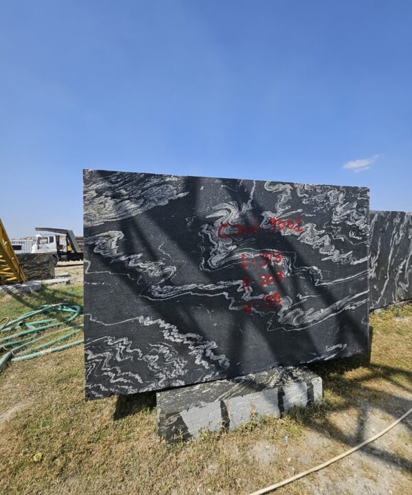 Product Overview: Reliance Titanium Black & Forest Black Granite is a luxurious natural stone celebrated for its striking black background enriched with flowing golden and white veins. Mined from our owned quarry, this granite represents strength, elegance, and timeless beauty — making it a preferred choice for high-end architectural and interior projects across the globe. Each block is a unique creation of nature, offering unmatched character and visual depth. Technical Specifications: Title Reliance Titanium Black & Forest Black Granite Block Stone Type Granite Block Type Gangsaw Block Block Size 300 CM x 180 CM x 180 CM (LXWXH) Color Deep Black with Gold & White Veins Surface Finish Options Wire Saw Cut Density 2960-3000 kg/m3 Compressive Strength 200-250 MPa Water Absorption 0.2%-0.3% Hardness (Mohs) 6 to 7 Porosity Low Origin India Applications Slabs, Countertops, Flooring, Wall Cladding, Interior Key Features: Elegant Aesthetic Appeal: Deep jet-black background enhanced by golden and silver waves — a naturally luxurious look. Superior Strength & Durability: Excellent structural integrity and long-term performance in varied climates. High Polish Retention: Achieves exceptional gloss and mirror-like reflection after finishing. Consistent Texture: Uniform color and grain suitable for large-scale architectural applications. Versatile Application Range: Perfect for multiple interior purposes. Low Maintenance: Resistant to stains, scratches, and moisture, ensuring lasting beauty with minimal upkeep. Export-Grade Blocks: Carefully selected and cut for optimal slab yield and international market standards. Recommended Uses: Kitchen Countertops & Islands Luxury Flooring & Staircases Hotel Lobbies & Reception Areas Wall Cladding & Facades Memorials & Monuments Designer Furniture Tops Why Choose Reliance Titanium Black Granite and Forest Black Granite? Our granite is preferred by export buyers because of: Natural white veins and attractive deep black surface Zero crack, high strength and durability, suitable for projects & reprocessing Consistent Gang Saw block sizes Strict quality checks for each block before shipment Reliable and stable long-term supply Export Capabilities & Payment Terms: We provide smooth, professional export handling with: Payment Options: L/C at sight (Letter of Credit at sight) D/P (Documents Against Payment) T/T advance (if preferred by the buyer) Shipping Documents Provided: Bill of Lading (BL) Commercial Invoice Packing List Certificate of Origin Other documents as per buyer requirements Shipping Price Options: FOB (Indian Port) CNF (any destination port globally) Our logistics team ensures timely loading, documentation, and shipment coordination for a hassle-free experience. About Reliance Mines & Minerals We have a strong presence in the global stone industry, regularly exporting to China, Germany, USA, Oman, and Qatar . Our team is experienced in international trade procedures, ensuring professional communication and smooth cooperation with all partners. We Welcome Your Inquiry If your company is seeking a reliable supplier for premium Titanium black & Forest black granite blocks, we would be pleased to offer quotations, block photos, videos and quarry videos and further details. We look forward to establishing a long-term and successful business relationship with your esteemed company. More About Reliance Titanium Black & Forest Black Granite: Reliance Titanium Black & Forest Black Granite combines natural elegance with engineering excellence. Its bold veins and premium polish bring sophistication to any architectural space, while its robust physical properties ensure durability even in demanding environments. Each block is meticulously extracted and inspected to meet international export quality benchmarks. Reliance Mines & Minerals specializes in the sales and global export of premium granite blocks and slabs. With years of experience in the stone industry, we have established a strong presence in international markets. We are committed to delivering top-quality granite with timely and reliable shipments to major ports worldwide. Our dedicated sales and logistics team is highly skilled in managing export documentation, container loading, and shipping procedures, ensuring a smooth and hassle-free experience for our clients. At the heart of our business is a focus on excellence, professionalism, and customer satisfaction, making us a trusted partner for granite buyers around the globe. 印度 花岗岩 块料 泰坦黑 花岗岩 印度 森林黑 花岗岩 印度 印度 花岗岩 块料, 印度 出口 花岗岩 块, 印度花岗岩原石 中国进口 India granite block Titanium Black granite India Forest Black granite India Granite Blocks Titanium Black Granite Reliance Titanium Black Granite Titanium Black Granite Slabs Polished Titanium Black Granite Bookmatch Titanium Black Granite Titanium Black Granite Exporters India Titanium Black Granite Suppliers Titanium Black Granite Manufacturers Exotic Black Granite with White Veins Deep Black Granite Slabs Mirror Polished Granite Luxury Granite for Interior Walls Natural Stone for Modern Architecture High Gloss Granite Panels Bookmatched Granite Wall Design Black Granite for Hotel Lobby & Flooring Designer Granite Slabs for Projects Indian Granite Exporters Premium Granite from India Granite Slabs for Export Worldwide Granite Supplier Natural Stone Exporter from India Wholesale Granite Supplier Black Granite for Construction & Interiors Architectural Granite Stone Supplier Custom Cut Granite Slabs Export Granite for Wall Cladding Granite for Flooring Granite for Kitchen Countertops Granite for Hotel & Commercial Projects Interior Stone Cladding Luxury Stone for Architects & Designers Black Forest Granite supplier Black Forest Granite manufacturer Black Forest Granite exporter Black Forest Granite quarry Black Forest Granite wholesaler Black Forest Granite seller Buy Black Forest Granite blocks Buy Black Forest Granite slabs Black Forest Granite for flooring Black Forest Granite for countertops Black Forest Granite for wall cladding Black Forest Granite price per sqm Black Forest Granite bulk supplier Black Forest Granite block exporter Black Forest Granite slab manufacturer Black Forest Granite quarry owner Black Forest Granite wholesale price Black Forest Granite large quantity supplier Black Forest Granite custom sizes Black Forest Granite supplier India Black Forest Granite manufacturer India Black Forest Granite exporter India Black Forest Granite quarry India Black Forest Granite supplier [Your City/State] Black Forest Granite international exporter Premium Black Forest Granite supplier Natural Black Forest Granite stone High quality Black Forest Granite slabs Black Forest Granite direct from quarry Black Forest Granite blocks for export Black Forest Granite polished slabs Black granite stone supplier Natural granite stone exporter Indian black granite manufacturer Granite blocks and slabs exporter Dimension stone granite supplier Nebula Wave Granite Stone Manufacturer Export Quality Blocks Supplier Quarry Reliance Mines India Titanium Black Granite Stone Manufacturer Export Quality Blocks Supplier Quarry Reliance Mines India Cosmic Black Granite Stone Manufacturer Export Quality Blocks Supplier Quarry Reliance Mines India Marquina Black Granite Stone Manufacturer Export Quality Blocks Supplier Quarry Reliance Mines India Black Forest Granite Stone Manufacturer Export Quality Blocks Supplier Quarry Reliance Mines India #TitaniumBlackGranite #RelianceGranite #IndianGranite #GraniteExporter #LuxuryGranite #GraniteSupplier #BlackGranite #NaturalStoneIndia #GraniteSlabs #GraniteBookmatch #InteriorDesignStone #ArchitecturalStone #PremiumGranite #GraniteExport #GraniteDesigns #reliancemines #granite #marble #stone #quarry #forestblackgranite