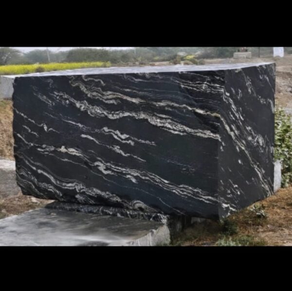 Product Overview: Reliance Titanium Black & Forest Black Granite is a luxurious natural stone celebrated for its striking black background enriched with flowing golden and white veins. Mined from our owned quarry, this granite represents strength, elegance, and timeless beauty — making it a preferred choice for high-end architectural and interior projects across the globe. Each block is a unique creation of nature, offering unmatched character and visual depth. Technical Specifications: Title Reliance Titanium Black & Forest Black Granite Block Stone Type Granite Block Type Gangsaw Block Block Size 300 CM x 180 CM x 180 CM (LXWXH) Color Deep Black with Gold & White Veins Surface Finish Options Wire Saw Cut Density 2960-3000 kg/m3 Compressive Strength 200-250 MPa Water Absorption 0.2%-0.3% Hardness (Mohs) 6 to 7 Porosity Low Origin India Applications Slabs, Countertops, Flooring, Wall Cladding, Interior Key Features: Elegant Aesthetic Appeal: Deep jet-black background enhanced by golden and silver waves — a naturally luxurious look. Superior Strength & Durability: Excellent structural integrity and long-term performance in varied climates. High Polish Retention: Achieves exceptional gloss and mirror-like reflection after finishing. Consistent Texture: Uniform color and grain suitable for large-scale architectural applications. Versatile Application Range: Perfect for multiple interior purposes. Low Maintenance: Resistant to stains, scratches, and moisture, ensuring lasting beauty with minimal upkeep. Export-Grade Blocks: Carefully selected and cut for optimal slab yield and international market standards. Recommended Uses: Kitchen Countertops & Islands Luxury Flooring & Staircases Hotel Lobbies & Reception Areas Wall Cladding & Facades Memorials & Monuments Designer Furniture Tops Why Choose Reliance Titanium Black Granite and Forest Black Granite? Our granite is preferred by export buyers because of: Natural white veins and attractive deep black surface Zero crack, high strength and durability, suitable for projects & reprocessing Consistent Gang Saw block sizes Strict quality checks for each block before shipment Reliable and stable long-term supply Export Capabilities & Payment Terms: We provide smooth, professional export handling with: Payment Options: L/C at sight (Letter of Credit at sight) D/P (Documents Against Payment) T/T advance (if preferred by the buyer) Shipping Documents Provided: Bill of Lading (BL) Commercial Invoice Packing List Certificate of Origin Other documents as per buyer requirements Shipping Price Options: FOB (Indian Port) CNF (any destination port globally) Our logistics team ensures timely loading, documentation, and shipment coordination for a hassle-free experience. About Reliance Mines & Minerals We have a strong presence in the global stone industry, regularly exporting to China, Germany, USA, Oman, and Qatar . Our team is experienced in international trade procedures, ensuring professional communication and smooth cooperation with all partners. We Welcome Your Inquiry If your company is seeking a reliable supplier for premium Titanium black & Forest black granite blocks, we would be pleased to offer quotations, block photos, videos and quarry videos and further details. We look forward to establishing a long-term and successful business relationship with your esteemed company. More About Reliance Titanium Black & Forest Black Granite: Reliance Titanium Black & Forest Black Granite combines natural elegance with engineering excellence. Its bold veins and premium polish bring sophistication to any architectural space, while its robust physical properties ensure durability even in demanding environments. Each block is meticulously extracted and inspected to meet international export quality benchmarks. Reliance Mines & Minerals specializes in the sales and global export of premium granite blocks and slabs. With years of experience in the stone industry, we have established a strong presence in international markets. We are committed to delivering top-quality granite with timely and reliable shipments to major ports worldwide. Our dedicated sales and logistics team is highly skilled in managing export documentation, container loading, and shipping procedures, ensuring a smooth and hassle-free experience for our clients. At the heart of our business is a focus on excellence, professionalism, and customer satisfaction, making us a trusted partner for granite buyers around the globe. 印度 花岗岩 块料 泰坦黑 花岗岩 印度 森林黑 花岗岩 印度 印度 花岗岩 块料, 印度 出口 花岗岩 块, 印度花岗岩原石 中国进口 India granite block Titanium Black granite India Forest Black granite India Granite Blocks Titanium Black Granite Reliance Titanium Black Granite Titanium Black Granite Slabs Polished Titanium Black Granite Bookmatch Titanium Black Granite Titanium Black Granite Exporters India Titanium Black Granite Suppliers Titanium Black Granite Manufacturers Exotic Black Granite with White Veins Deep Black Granite Slabs Mirror Polished Granite Luxury Granite for Interior Walls Natural Stone for Modern Architecture High Gloss Granite Panels Bookmatched Granite Wall Design Black Granite for Hotel Lobby & Flooring Designer Granite Slabs for Projects Indian Granite Exporters Premium Granite from India Granite Slabs for Export Worldwide Granite Supplier Natural Stone Exporter from India Wholesale Granite Supplier Black Granite for Construction & Interiors Architectural Granite Stone Supplier Custom Cut Granite Slabs Export Granite for Wall Cladding Granite for Flooring Granite for Kitchen Countertops Granite for Hotel & Commercial Projects Interior Stone Cladding Luxury Stone for Architects & Designers Black Forest Granite supplier Black Forest Granite manufacturer Black Forest Granite exporter Black Forest Granite quarry Black Forest Granite wholesaler Black Forest Granite seller Buy Black Forest Granite blocks Buy Black Forest Granite slabs Black Forest Granite for flooring Black Forest Granite for countertops Black Forest Granite for wall cladding Black Forest Granite price per sqm Black Forest Granite bulk supplier Black Forest Granite block exporter Black Forest Granite slab manufacturer Black Forest Granite quarry owner Black Forest Granite wholesale price Black Forest Granite large quantity supplier Black Forest Granite custom sizes Black Forest Granite supplier India Black Forest Granite manufacturer India Black Forest Granite exporter India Black Forest Granite quarry India Black Forest Granite supplier [Your City/State] Black Forest Granite international exporter Premium Black Forest Granite supplier Natural Black Forest Granite stone High quality Black Forest Granite slabs Black Forest Granite direct from quarry Black Forest Granite blocks for export Black Forest Granite polished slabs Black granite stone supplier Natural granite stone exporter Indian black granite manufacturer Granite blocks and slabs exporter Dimension stone granite supplier Nebula Wave Granite Stone Manufacturer Export Quality Blocks Supplier Quarry Reliance Mines India Titanium Black Granite Stone Manufacturer Export Quality Blocks Supplier Quarry Reliance Mines India Cosmic Black Granite Stone Manufacturer Export Quality Blocks Supplier Quarry Reliance Mines India Marquina Black Granite Stone Manufacturer Export Quality Blocks Supplier Quarry Reliance Mines India Black Forest Granite Stone Manufacturer Export Quality Blocks Supplier Quarry Reliance Mines India #TitaniumBlackGranite #RelianceGranite #IndianGranite #GraniteExporter #LuxuryGranite #GraniteSupplier #BlackGranite #NaturalStoneIndia #GraniteSlabs #GraniteBookmatch #InteriorDesignStone #ArchitecturalStone #PremiumGranite #GraniteExport #GraniteDesigns #reliancemines #granite #marble #stone #quarry #forestblackgranite
