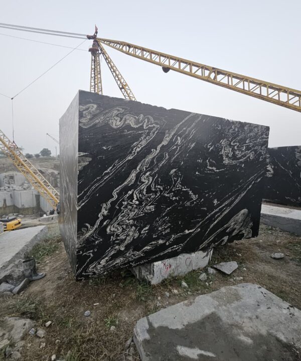 Product Overview: Reliance Titanium Black & Forest Black Granite is a luxurious natural stone celebrated for its striking black background enriched with flowing golden and white veins. Mined from our owned quarry, this granite represents strength, elegance, and timeless beauty — making it a preferred choice for high-end architectural and interior projects across the globe. Each block is a unique creation of nature, offering unmatched character and visual depth. Technical Specifications: Title Reliance Titanium Black & Forest Black Granite Block Stone Type Granite Block Type Gangsaw Block Block Size 300 CM x 180 CM x 180 CM (LXWXH) Color Deep Black with Gold & White Veins Surface Finish Options Wire Saw Cut Density 2960-3000 kg/m3 Compressive Strength 200-250 MPa Water Absorption 0.2%-0.3% Hardness (Mohs) 6 to 7 Porosity Low Origin India Applications Slabs, Countertops, Flooring, Wall Cladding, Interior Key Features: Elegant Aesthetic Appeal: Deep jet-black background enhanced by golden and silver waves — a naturally luxurious look. Superior Strength & Durability: Excellent structural integrity and long-term performance in varied climates. High Polish Retention: Achieves exceptional gloss and mirror-like reflection after finishing. Consistent Texture: Uniform color and grain suitable for large-scale architectural applications. Versatile Application Range: Perfect for multiple interior purposes. Low Maintenance: Resistant to stains, scratches, and moisture, ensuring lasting beauty with minimal upkeep. Export-Grade Blocks: Carefully selected and cut for optimal slab yield and international market standards. Recommended Uses: Kitchen Countertops & Islands Luxury Flooring & Staircases Hotel Lobbies & Reception Areas Wall Cladding & Facades Memorials & Monuments Designer Furniture Tops Why Choose Reliance Titanium Black Granite and Forest Black Granite? Our granite is preferred by export buyers because of: Natural white veins and attractive deep black surface Zero crack, high strength and durability, suitable for projects & reprocessing Consistent Gang Saw block sizes Strict quality checks for each block before shipment Reliable and stable long-term supply Export Capabilities & Payment Terms: We provide smooth, professional export handling with: Payment Options: L/C at sight (Letter of Credit at sight) D/P (Documents Against Payment) T/T advance (if preferred by the buyer) Shipping Documents Provided: Bill of Lading (BL) Commercial Invoice Packing List Certificate of Origin Other documents as per buyer requirements Shipping Price Options: FOB (Indian Port) CNF (any destination port globally) Our logistics team ensures timely loading, documentation, and shipment coordination for a hassle-free experience. About Reliance Mines & Minerals We have a strong presence in the global stone industry, regularly exporting to China, Germany, USA, Oman, and Qatar . Our team is experienced in international trade procedures, ensuring professional communication and smooth cooperation with all partners. We Welcome Your Inquiry If your company is seeking a reliable supplier for premium Titanium black & Forest black granite blocks, we would be pleased to offer quotations, block photos, videos and quarry videos and further details. We look forward to establishing a long-term and successful business relationship with your esteemed company. More About Reliance Titanium Black & Forest Black Granite: Reliance Titanium Black & Forest Black Granite combines natural elegance with engineering excellence. Its bold veins and premium polish bring sophistication to any architectural space, while its robust physical properties ensure durability even in demanding environments. Each block is meticulously extracted and inspected to meet international export quality benchmarks. Reliance Mines & Minerals specializes in the sales and global export of premium granite blocks and slabs. With years of experience in the stone industry, we have established a strong presence in international markets. We are committed to delivering top-quality granite with timely and reliable shipments to major ports worldwide. Our dedicated sales and logistics team is highly skilled in managing export documentation, container loading, and shipping procedures, ensuring a smooth and hassle-free experience for our clients. At the heart of our business is a focus on excellence, professionalism, and customer satisfaction, making us a trusted partner for granite buyers around the globe. 印度 花岗岩 块料 泰坦黑 花岗岩 印度 森林黑 花岗岩 印度 印度 花岗岩 块料, 印度 出口 花岗岩 块, 印度花岗岩原石 中国进口 India granite block Titanium Black granite India Forest Black granite India Granite Blocks Titanium Black Granite Reliance Titanium Black Granite Titanium Black Granite Slabs Polished Titanium Black Granite Bookmatch Titanium Black Granite Titanium Black Granite Exporters India Titanium Black Granite Suppliers Titanium Black Granite Manufacturers Exotic Black Granite with White Veins Deep Black Granite Slabs Mirror Polished Granite Luxury Granite for Interior Walls Natural Stone for Modern Architecture High Gloss Granite Panels Bookmatched Granite Wall Design Black Granite for Hotel Lobby & Flooring Designer Granite Slabs for Projects Indian Granite Exporters Premium Granite from India Granite Slabs for Export Worldwide Granite Supplier Natural Stone Exporter from India Wholesale Granite Supplier Black Granite for Construction & Interiors Architectural Granite Stone Supplier Custom Cut Granite Slabs Export Granite for Wall Cladding Granite for Flooring Granite for Kitchen Countertops Granite for Hotel & Commercial Projects Interior Stone Cladding Luxury Stone for Architects & Designers Black Forest Granite supplier Black Forest Granite manufacturer Black Forest Granite exporter Black Forest Granite quarry Black Forest Granite wholesaler Black Forest Granite seller Buy Black Forest Granite blocks Buy Black Forest Granite slabs Black Forest Granite for flooring Black Forest Granite for countertops Black Forest Granite for wall cladding Black Forest Granite price per sqm Black Forest Granite bulk supplier Black Forest Granite block exporter Black Forest Granite slab manufacturer Black Forest Granite quarry owner Black Forest Granite wholesale price Black Forest Granite large quantity supplier Black Forest Granite custom sizes Black Forest Granite supplier India Black Forest Granite manufacturer India Black Forest Granite exporter India Black Forest Granite quarry India Black Forest Granite supplier [Your City/State] Black Forest Granite international exporter Premium Black Forest Granite supplier Natural Black Forest Granite stone High quality Black Forest Granite slabs Black Forest Granite direct from quarry Black Forest Granite blocks for export Black Forest Granite polished slabs Black granite stone supplier Natural granite stone exporter Indian black granite manufacturer Granite blocks and slabs exporter Dimension stone granite supplier Nebula Wave Granite Stone Manufacturer Export Quality Blocks Supplier Quarry Reliance Mines India Titanium Black Granite Stone Manufacturer Export Quality Blocks Supplier Quarry Reliance Mines India Cosmic Black Granite Stone Manufacturer Export Quality Blocks Supplier Quarry Reliance Mines India Marquina Black Granite Stone Manufacturer Export Quality Blocks Supplier Quarry Reliance Mines India Black Forest Granite Stone Manufacturer Export Quality Blocks Supplier Quarry Reliance Mines India #TitaniumBlackGranite #RelianceGranite #IndianGranite #GraniteExporter #LuxuryGranite #GraniteSupplier #BlackGranite #NaturalStoneIndia #GraniteSlabs #GraniteBookmatch #InteriorDesignStone #ArchitecturalStone #PremiumGranite #GraniteExport #GraniteDesigns #reliancemines #granite #marble #stone #quarry #forestblackgranite