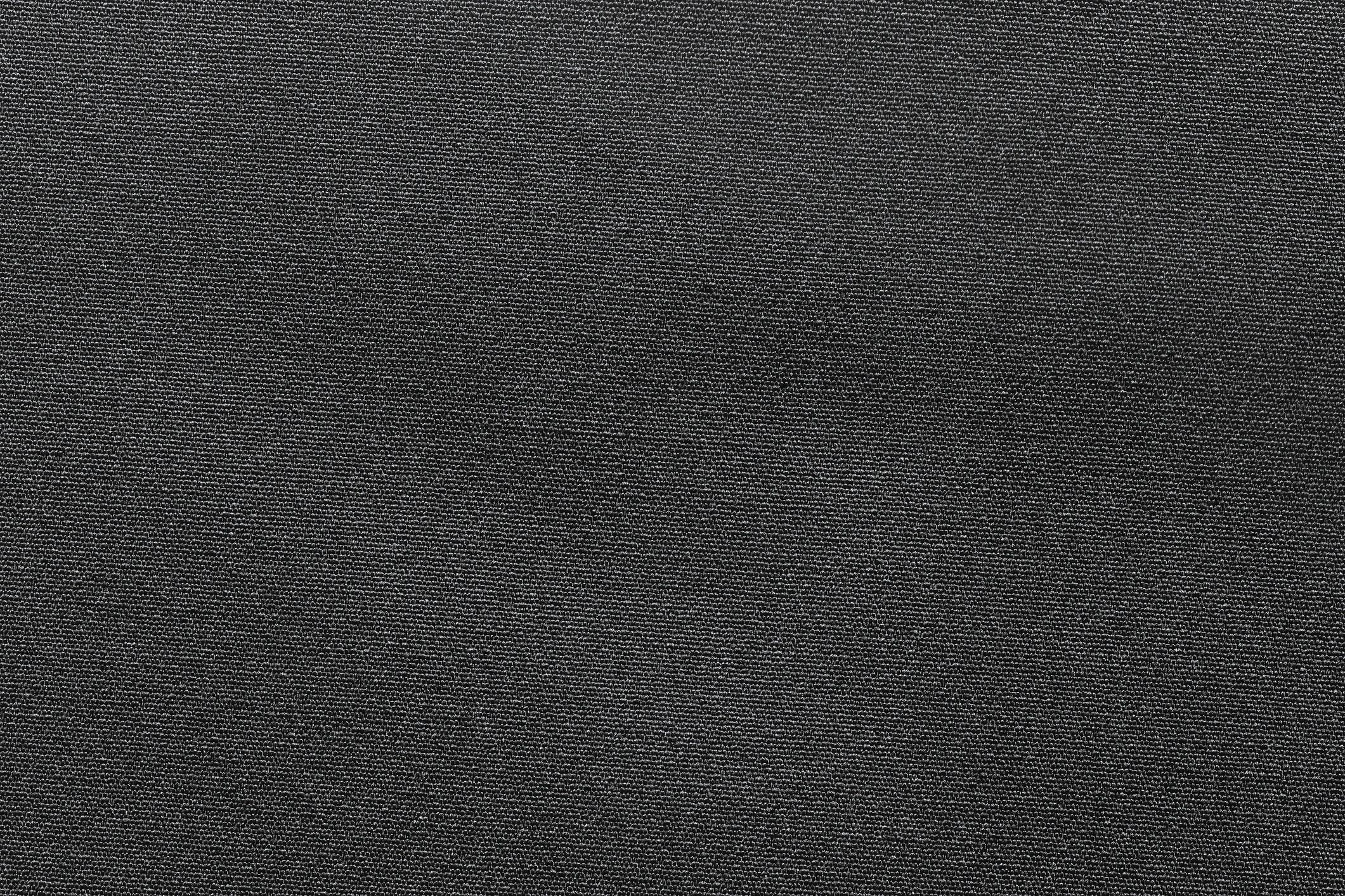 Dark black textured surface