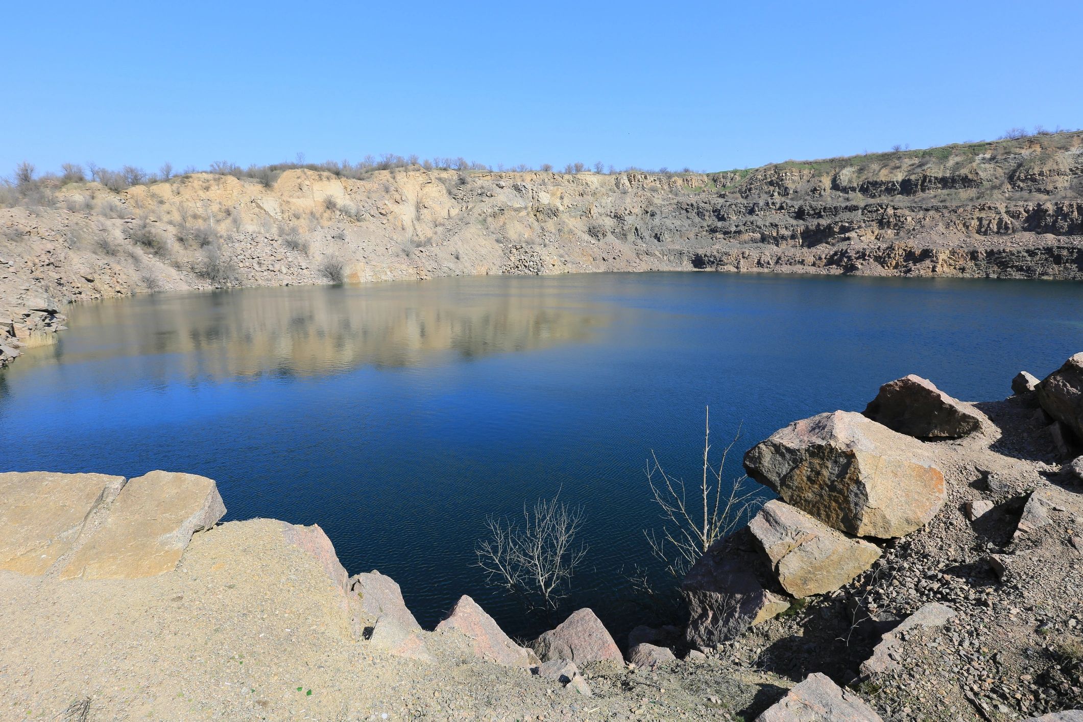 Quarry lake and stone cliffs