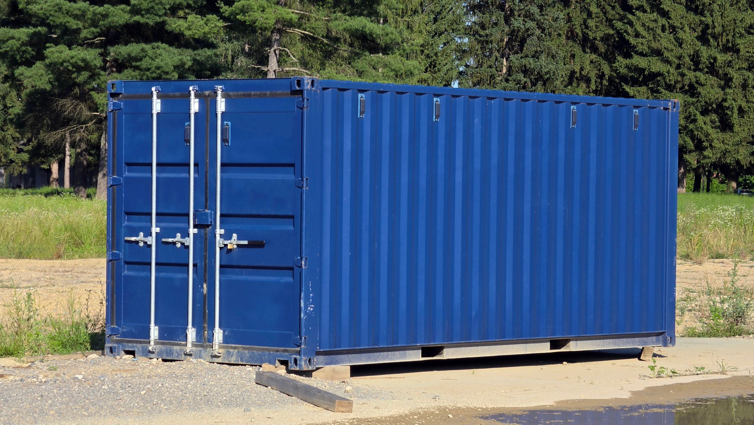 Shipping container prepared for secure freight movement